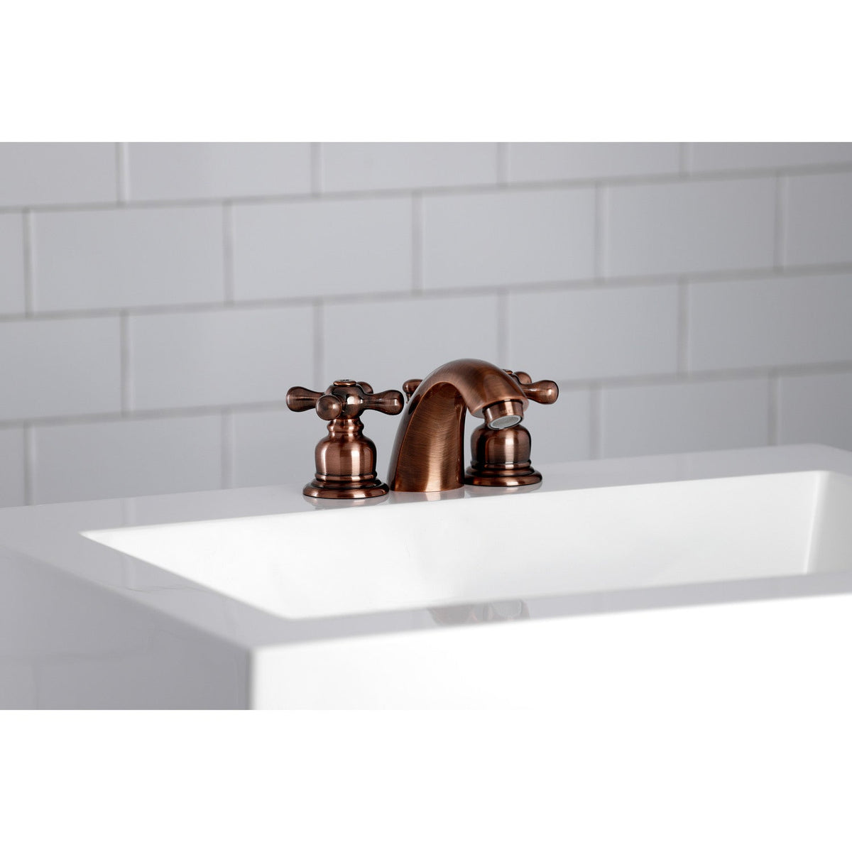 Victorian Mini-Widespread Bathroom Faucet with Pop-Up Drain in Antique Copper