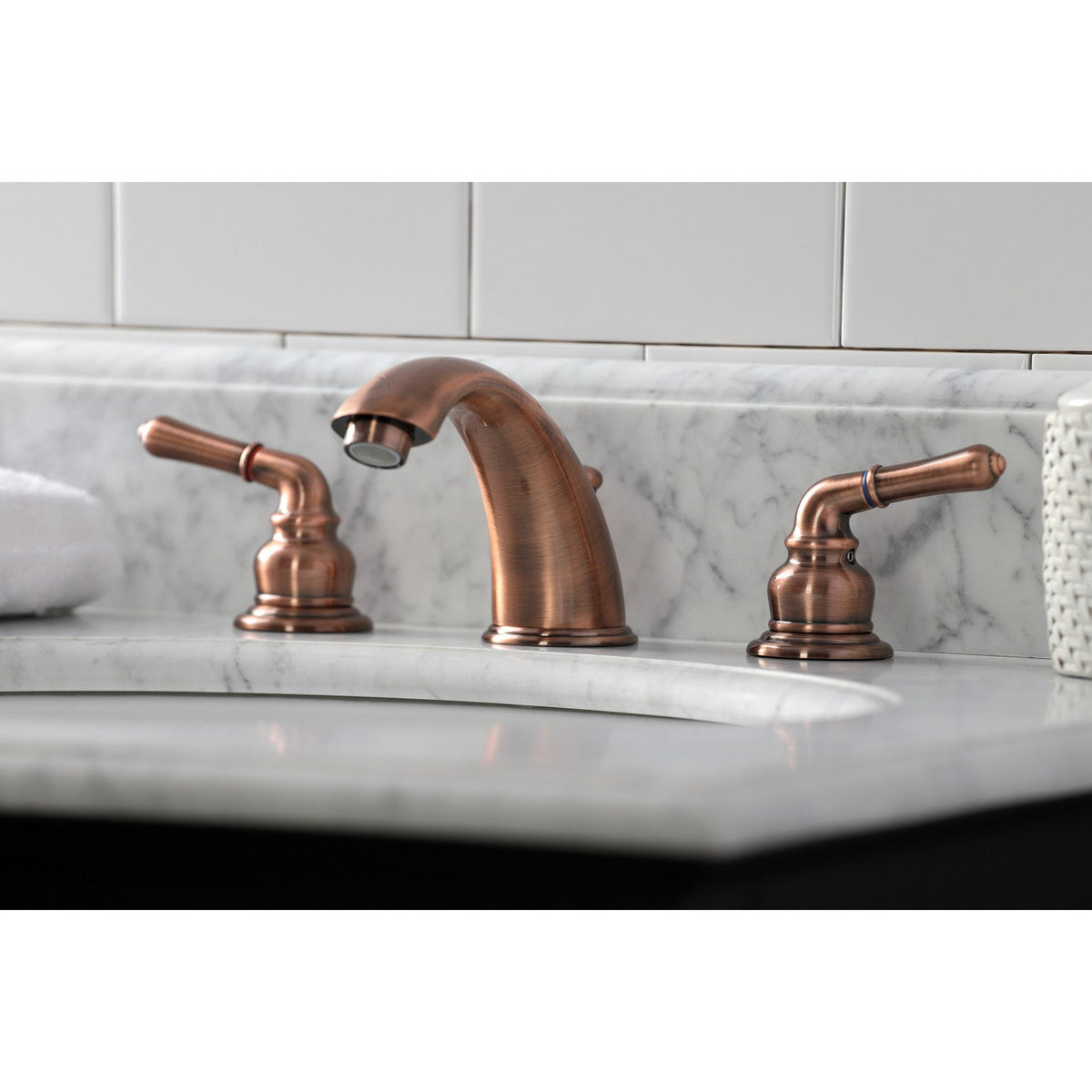 Magellan Widespread Bathroom Faucet with Pop-Up Drain in Antique Copper