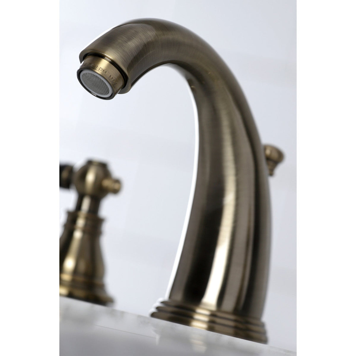 Duchess Widespread Bathroom Faucet with Pop-Up Drain in Antique Brass