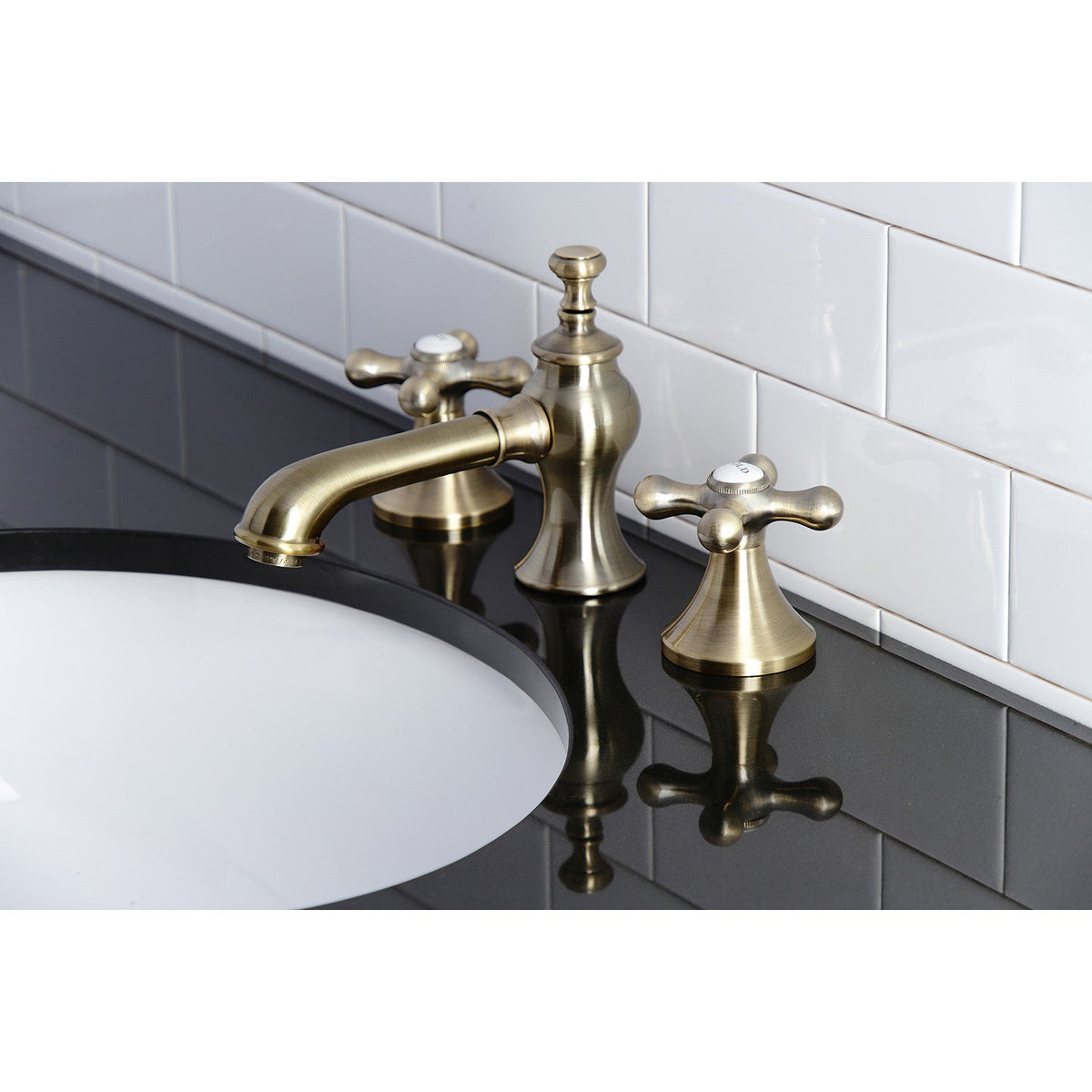 Vintage Widespread Bathroom Faucet with Brass Pop-Up in Antique Brass