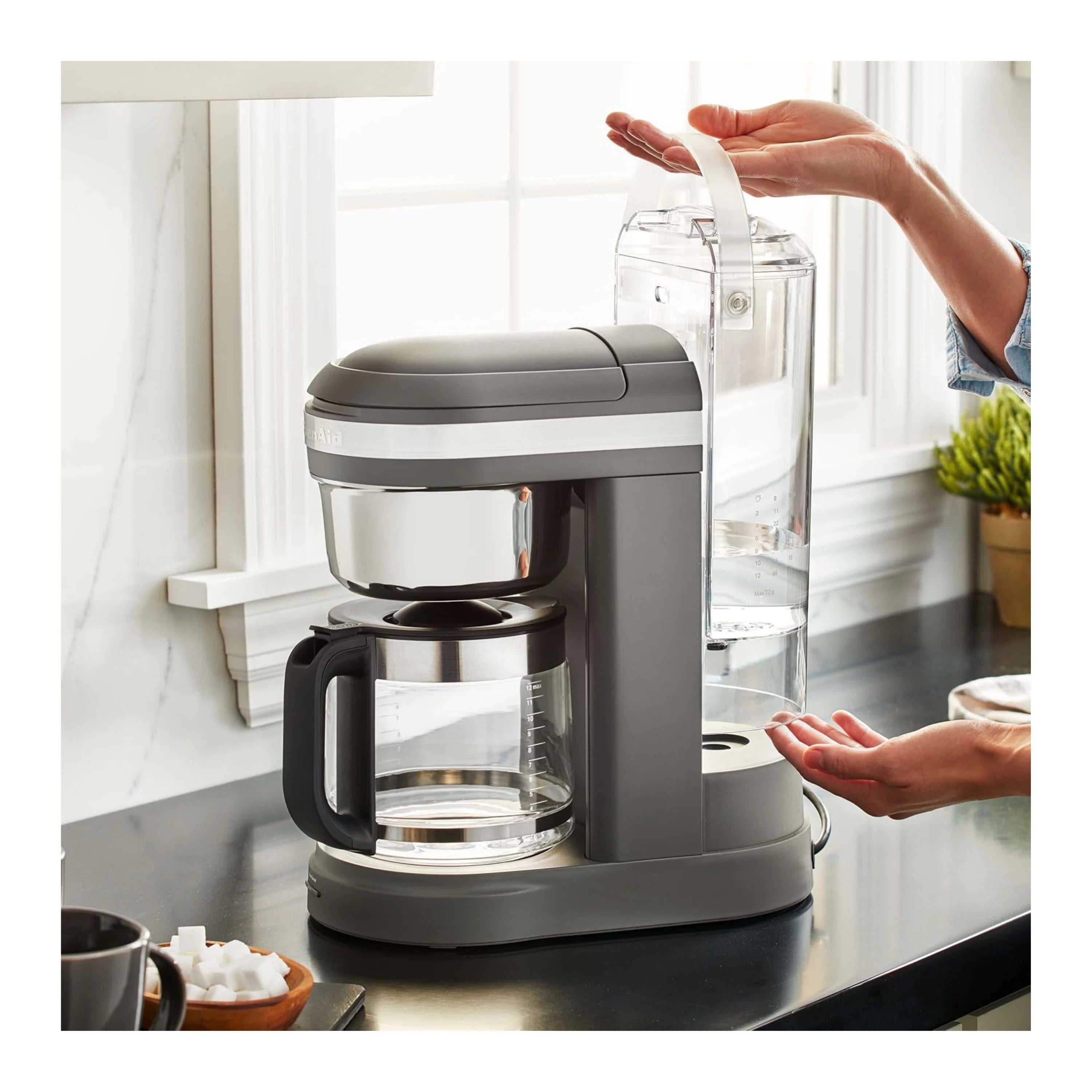 KitchenAid 12-cup drip coffee maker matte charcoal gray with open reservoir and glass carafe