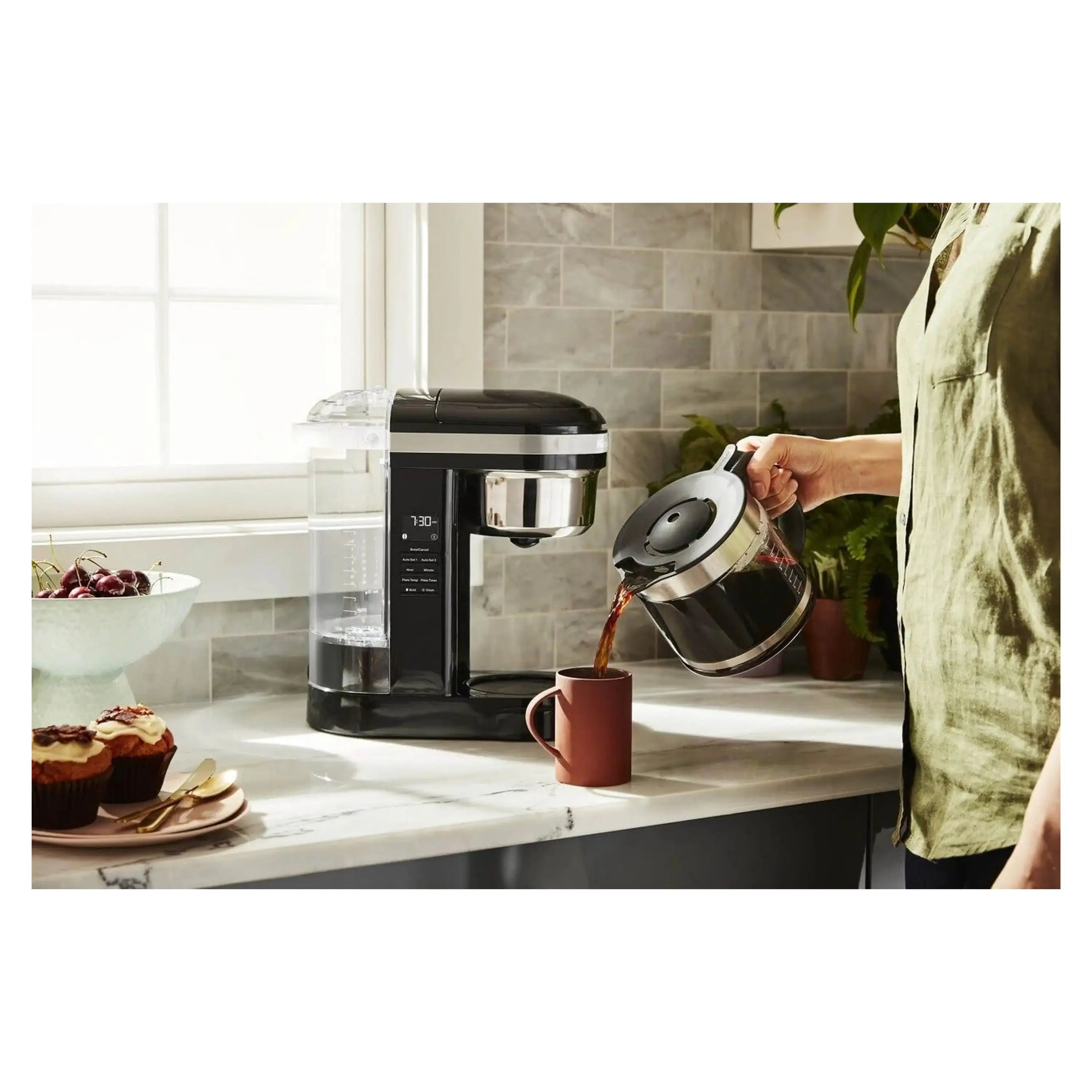 KitchenAid 12-cup drip coffee maker Onyx black on countertop with carafe