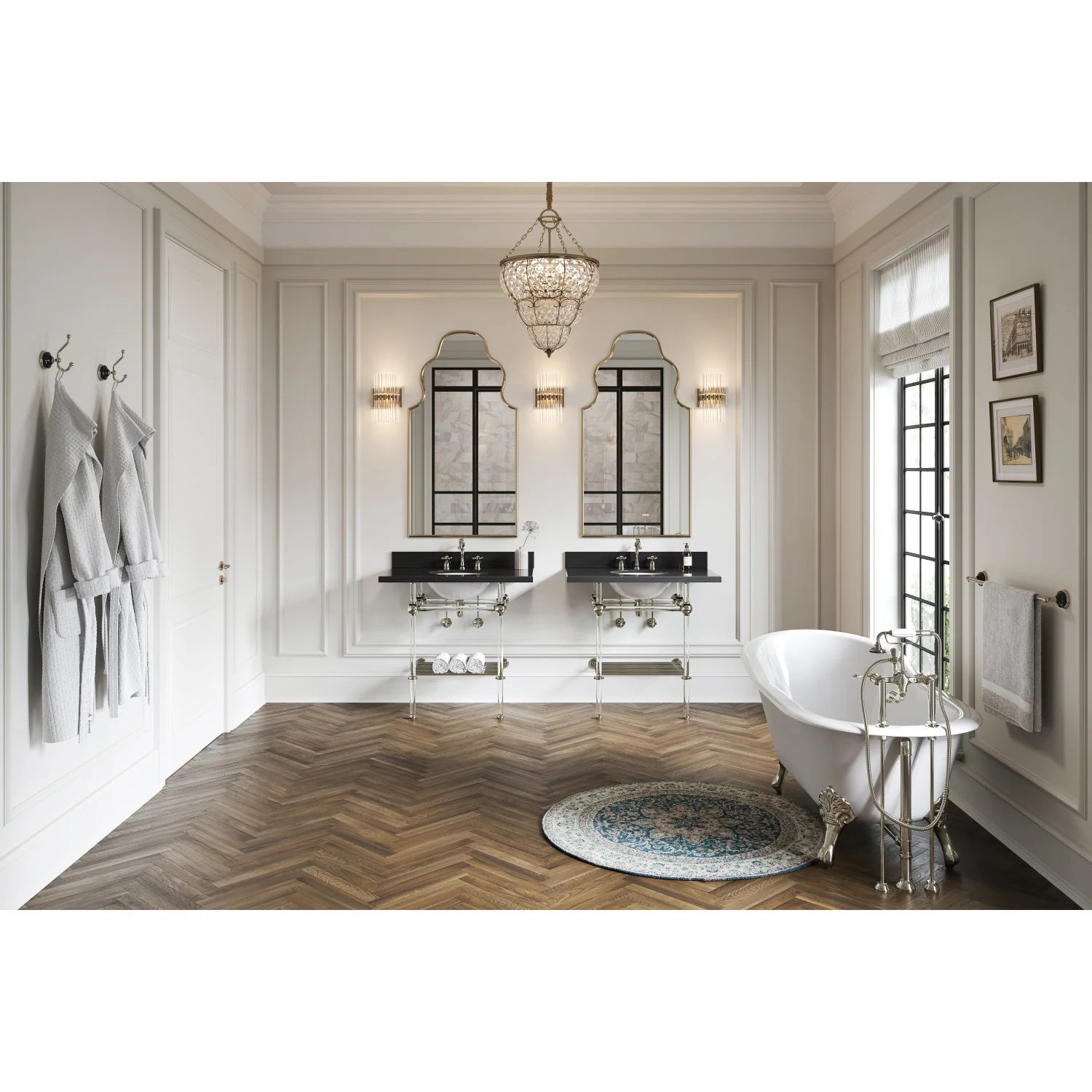 White oval slipper clawfoot tub with polished brass faucet and claw legs