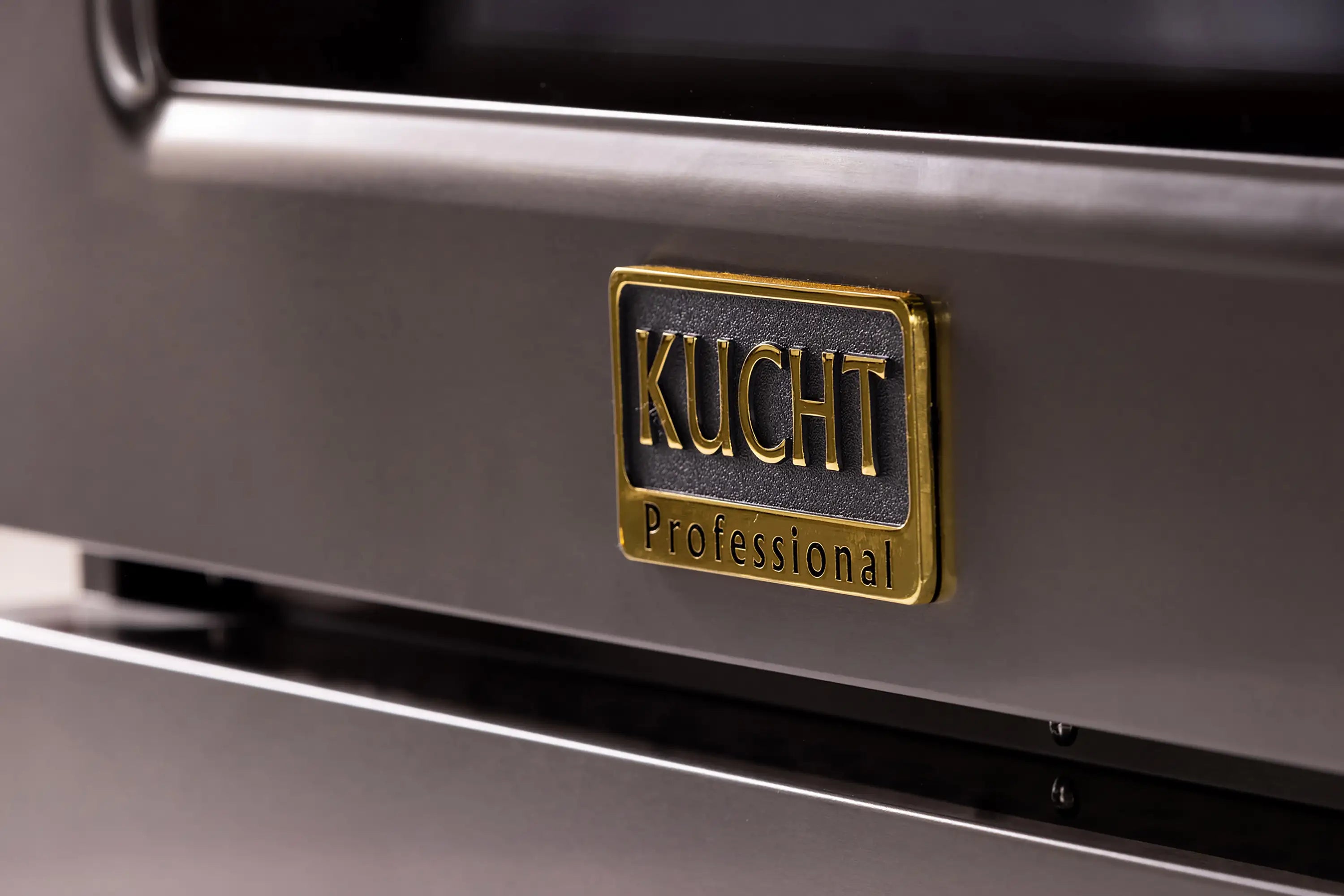 KUCHT Professional logo plaque on stainless oven door