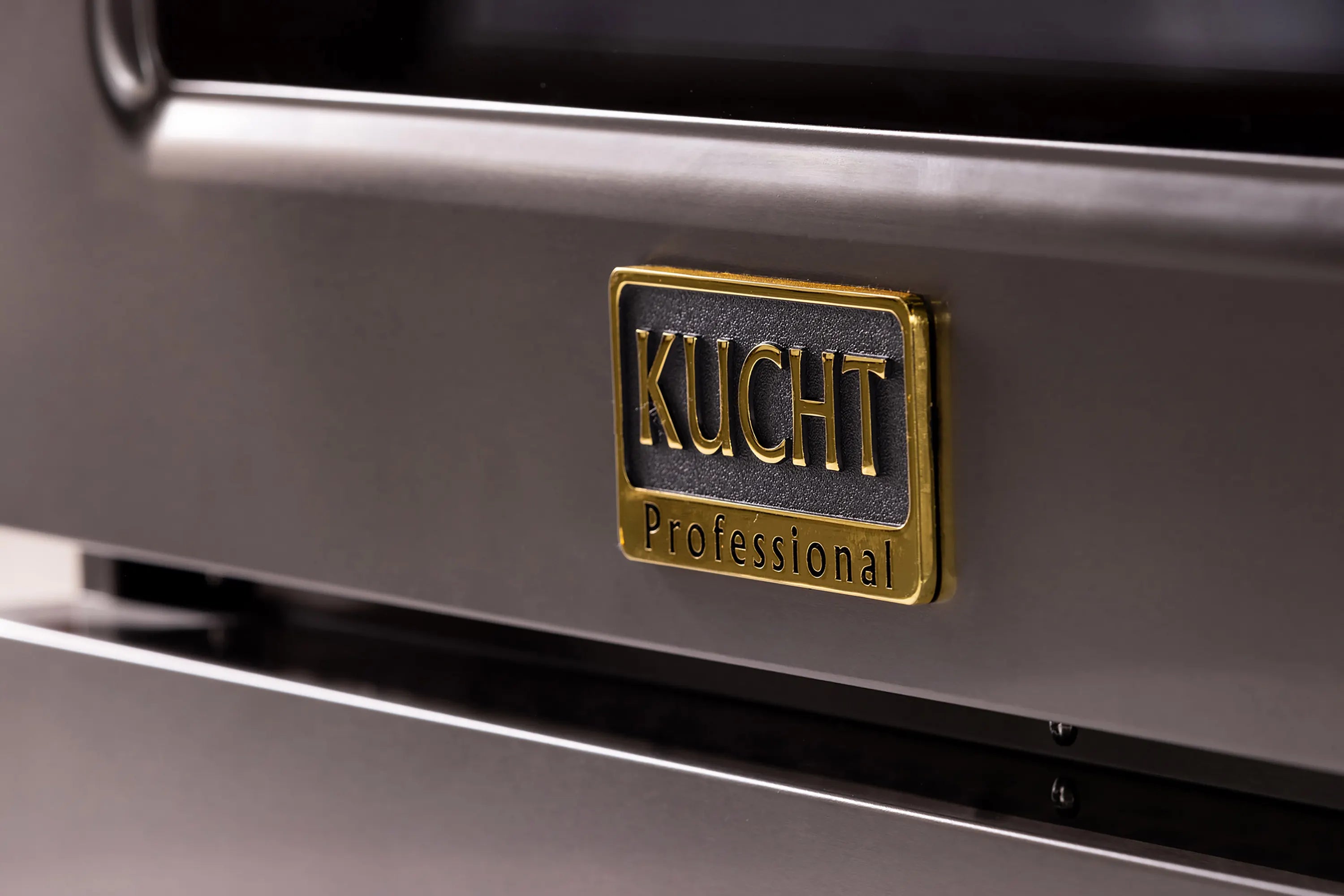 KUCHT Professional range front badge on stainless steel control panel