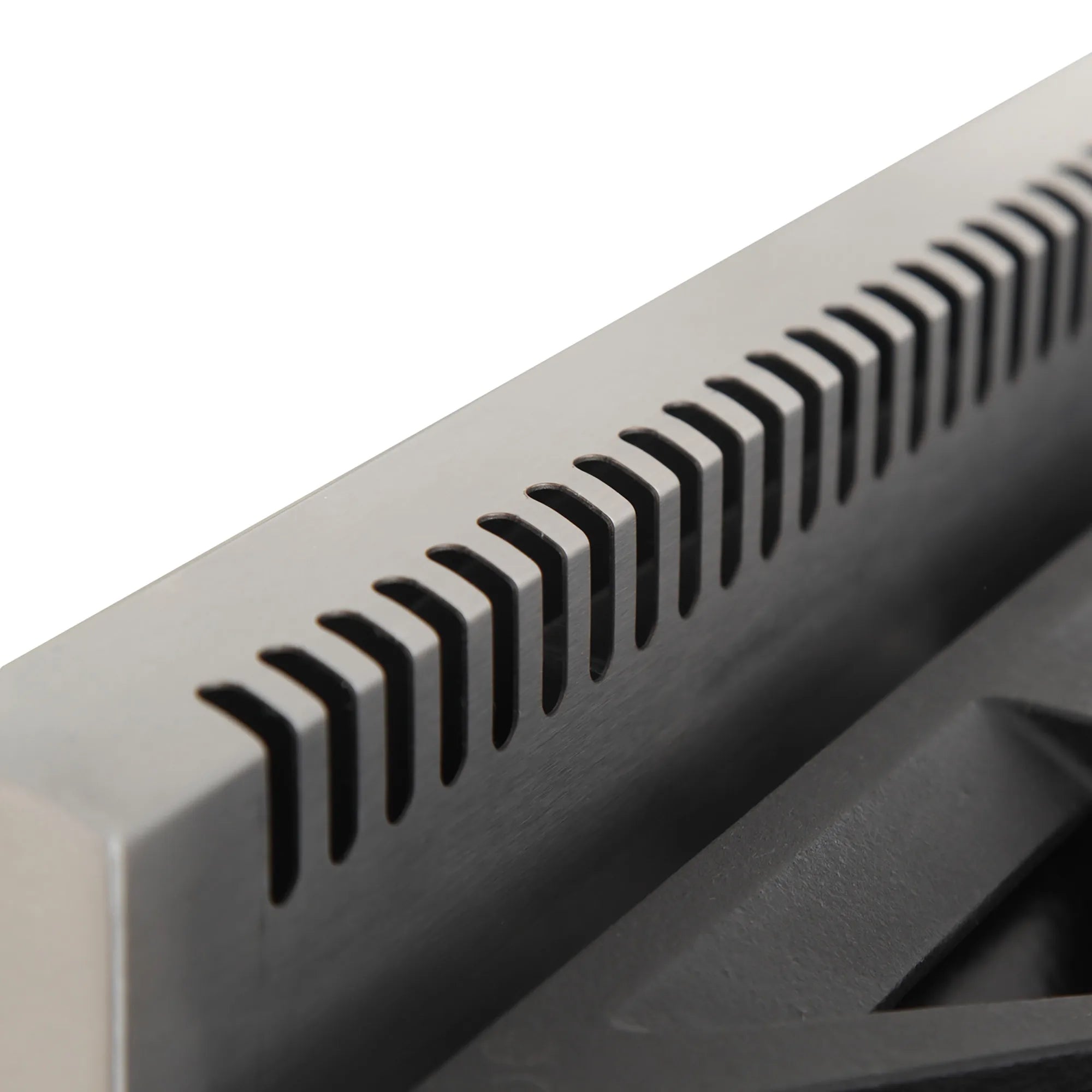 Stainless range back panel with black ventilation slots