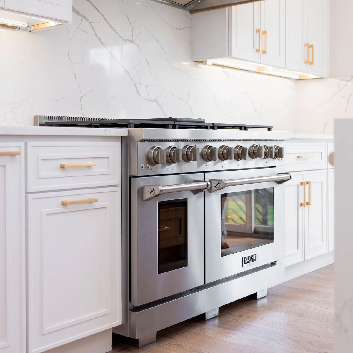 Stainless steel professional gas range with oven doors and front control panel