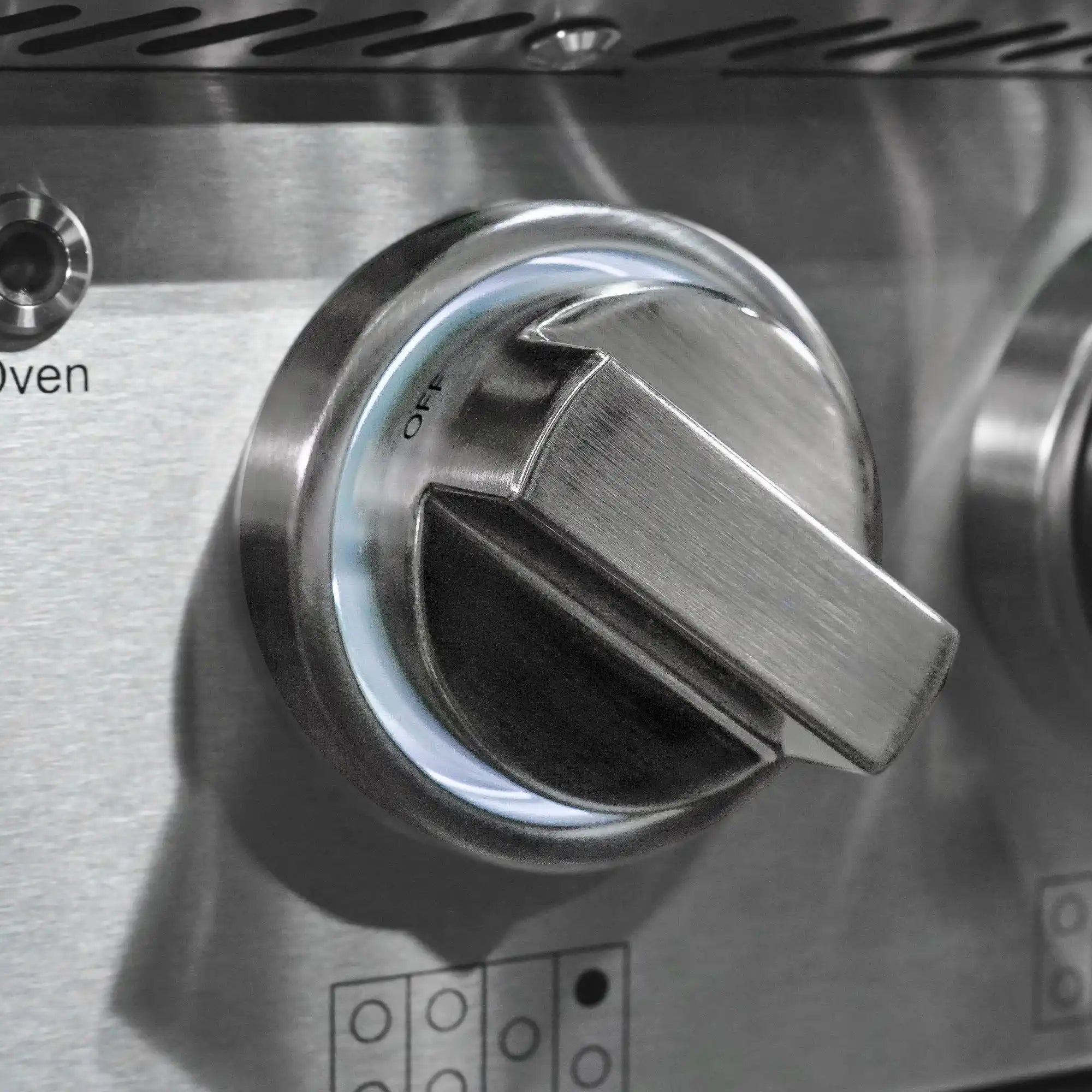 Stainless oven control knob with OFF marking on gas range
