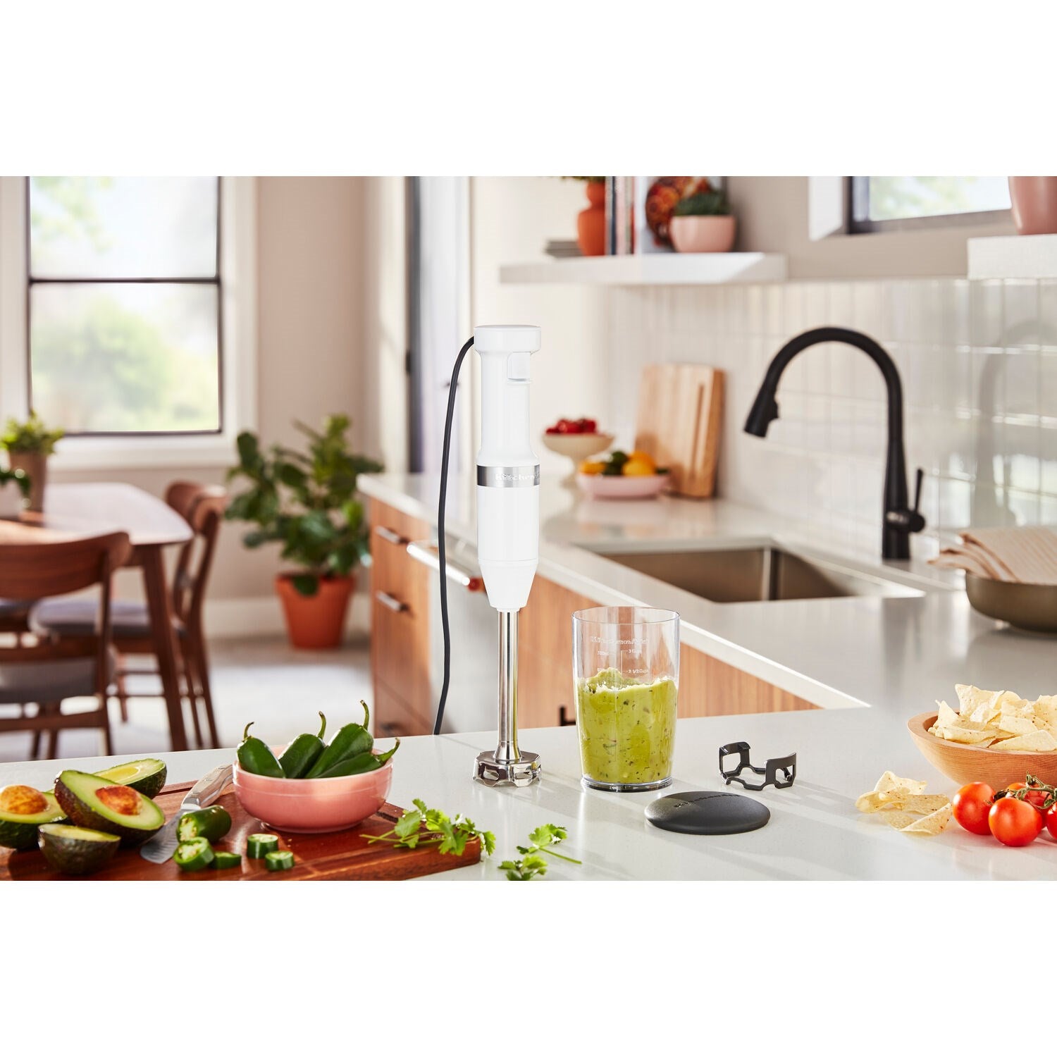 White immersion blender with blending jar, lid, and black control cap