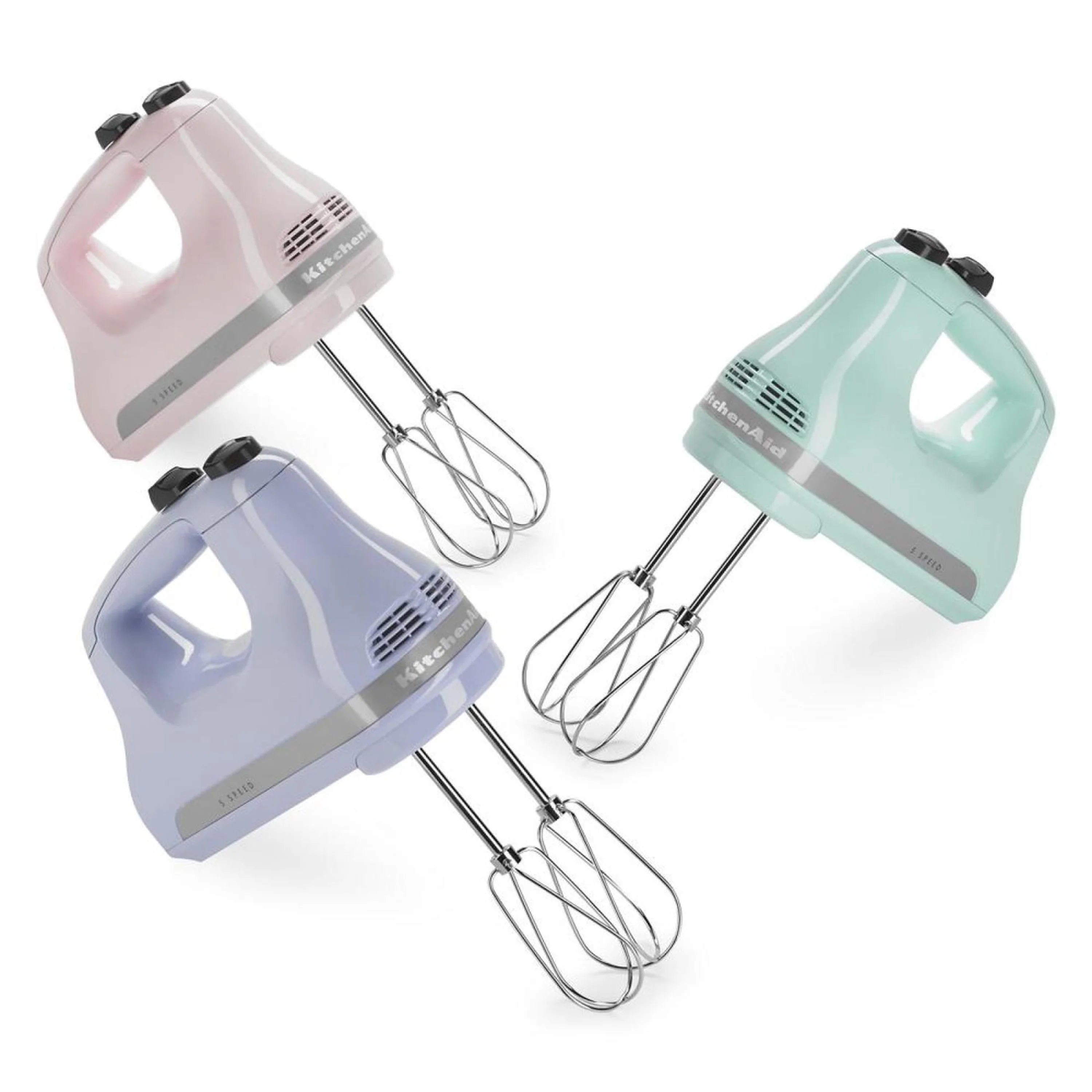 Pastel KitchenAid hand mixers, including an ice-colored unit with two chrome beaters