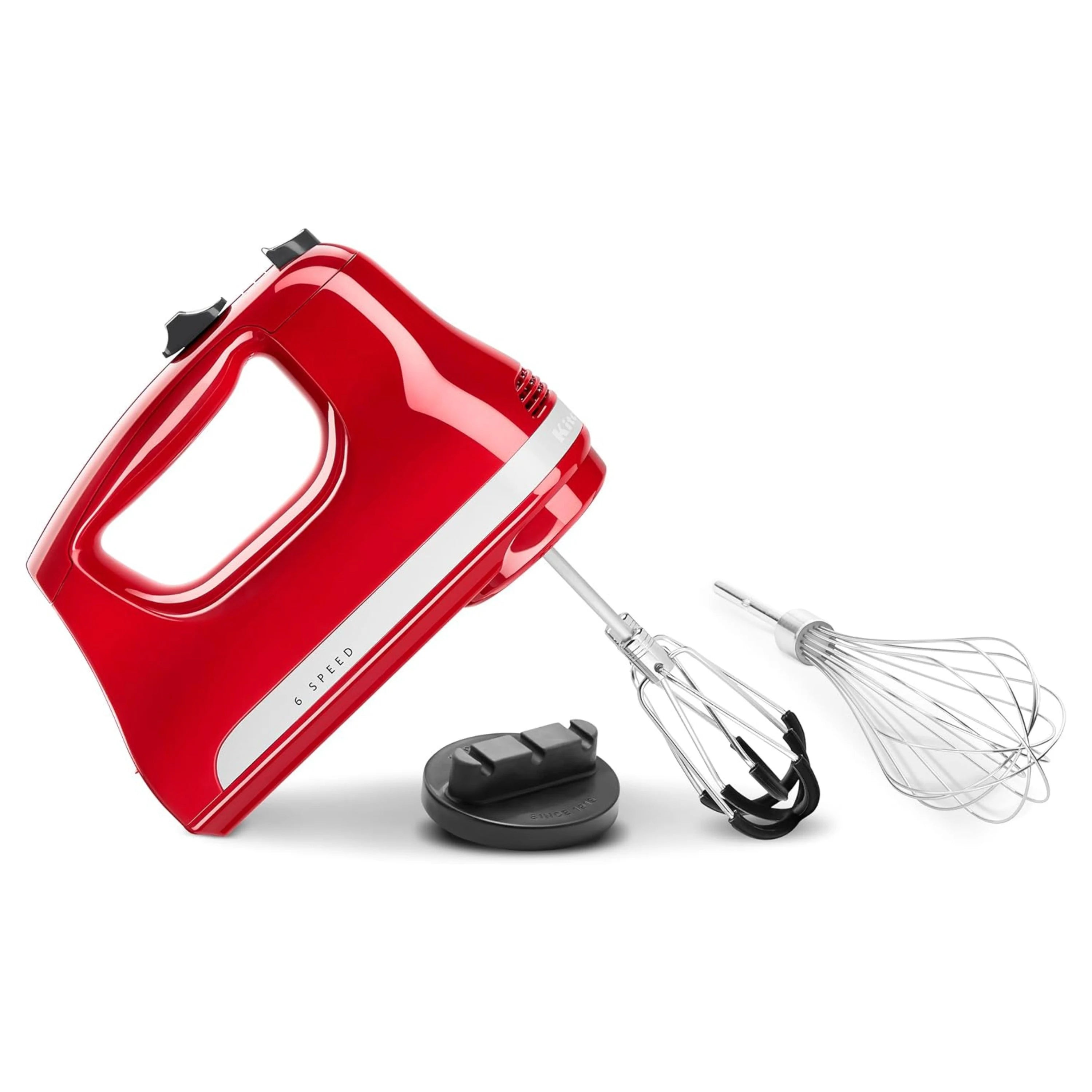 Red hand mixer with two beaters, balloon whisk, and base stand