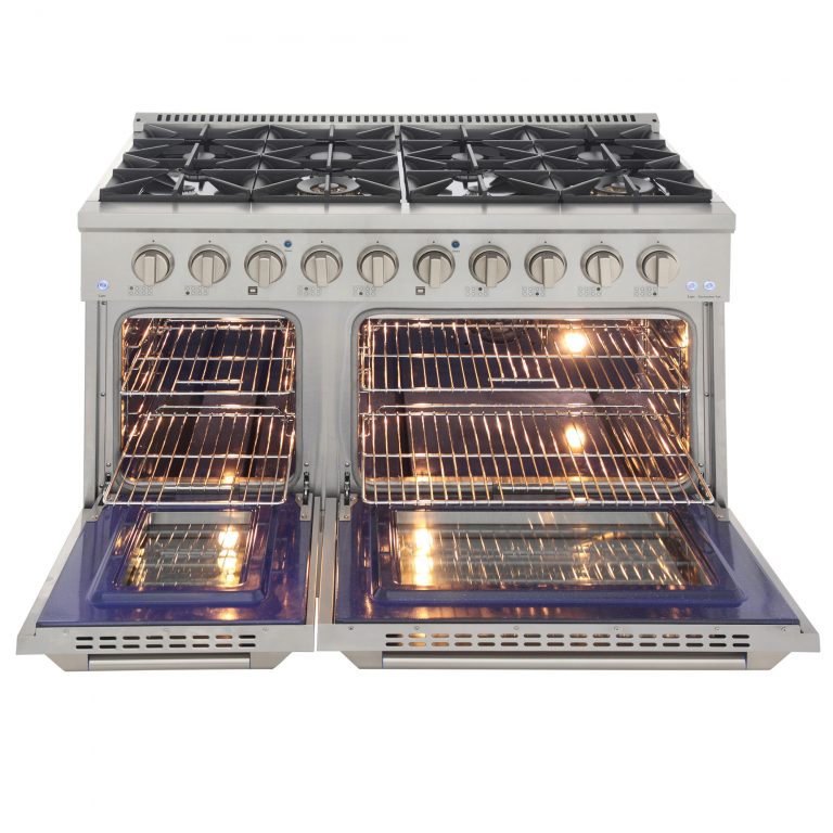 Open convection oven with glowing heating elements and two wire racks