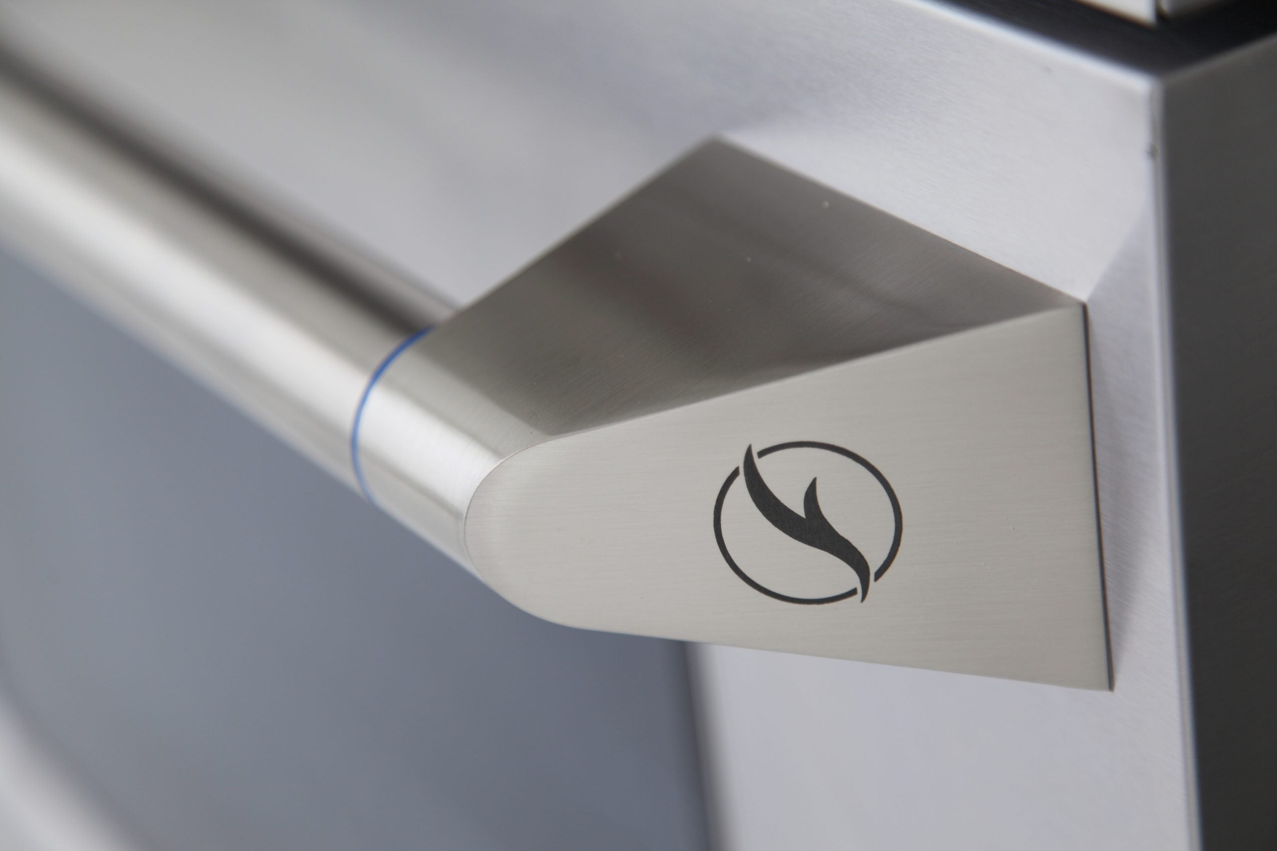 Stainless control knob with flame icon on dual fuel range