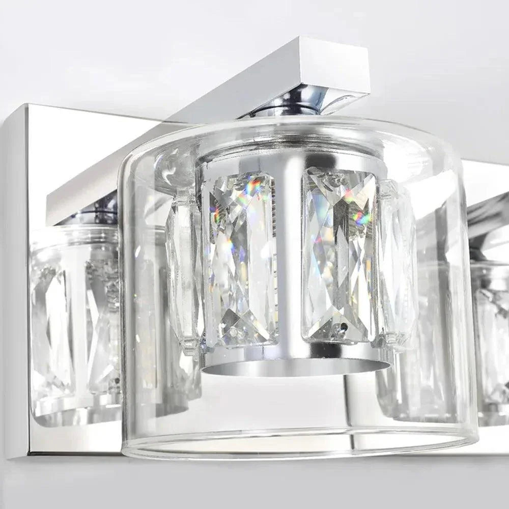 Chrome 3-light vanity light with clear faceted glass shade and cylindrical bulbs