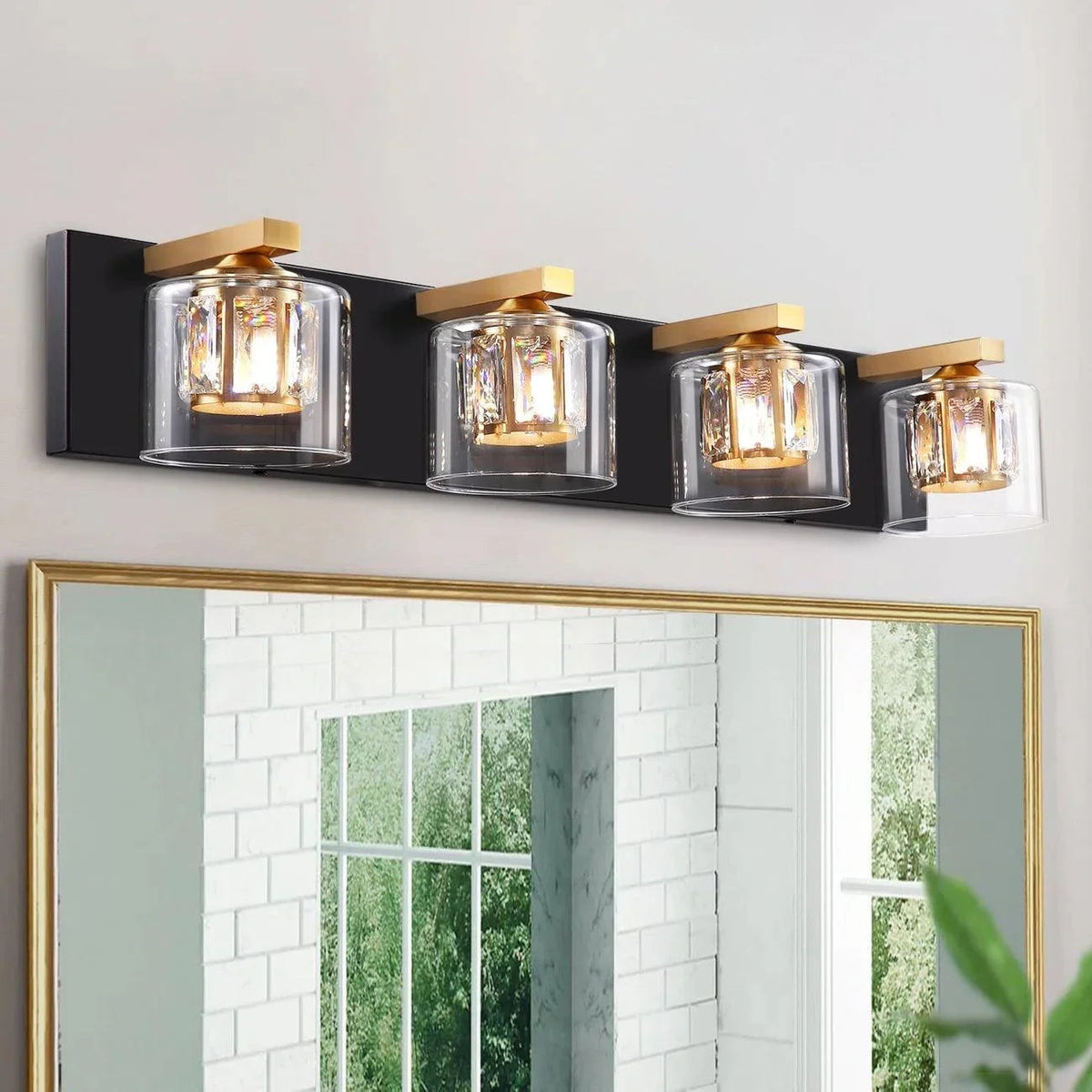 Modern 4-light bathroom vanity light with clear glass shades and gold accents on black