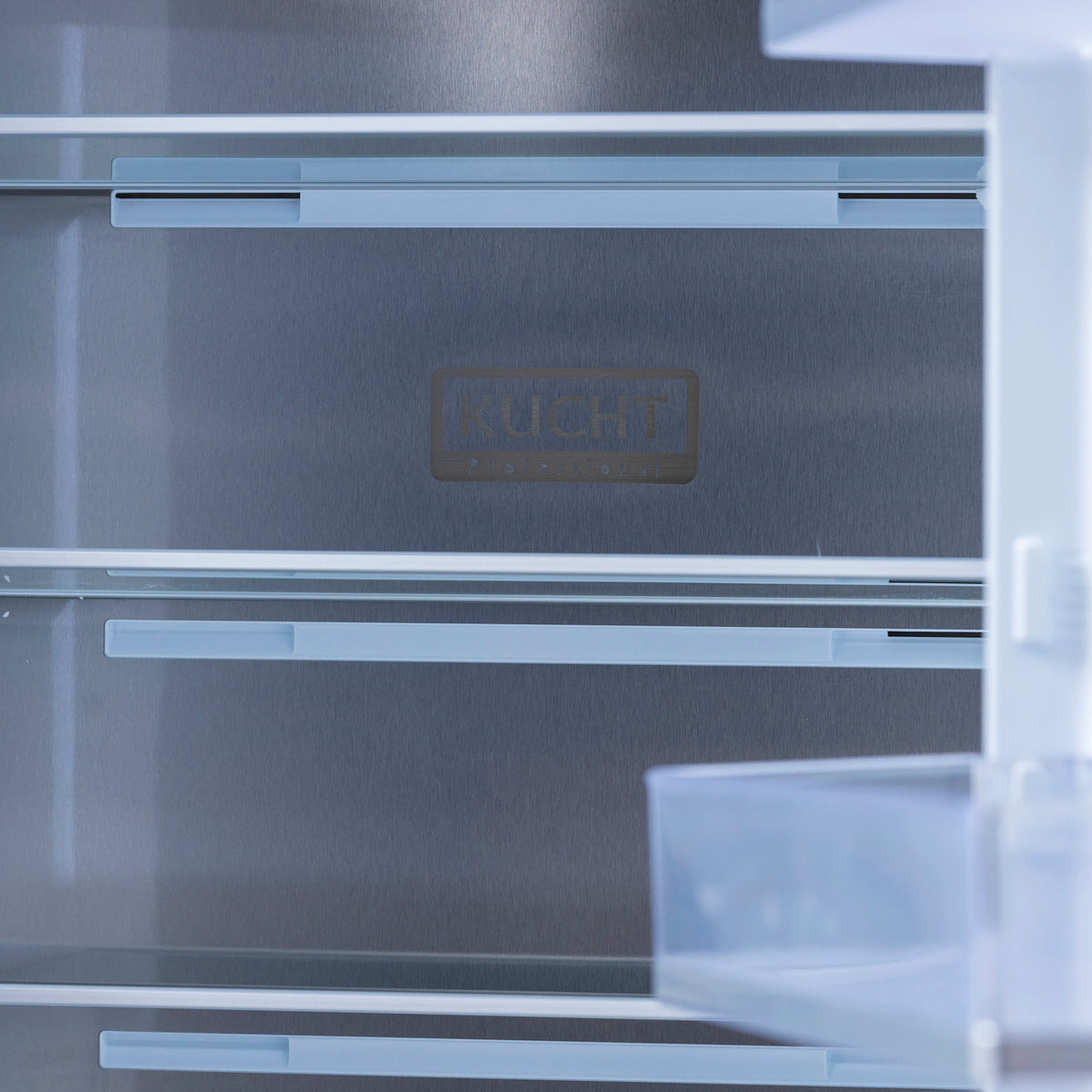 Built-in refrigerator interior back wall with Kucht logo and horizontal air channels