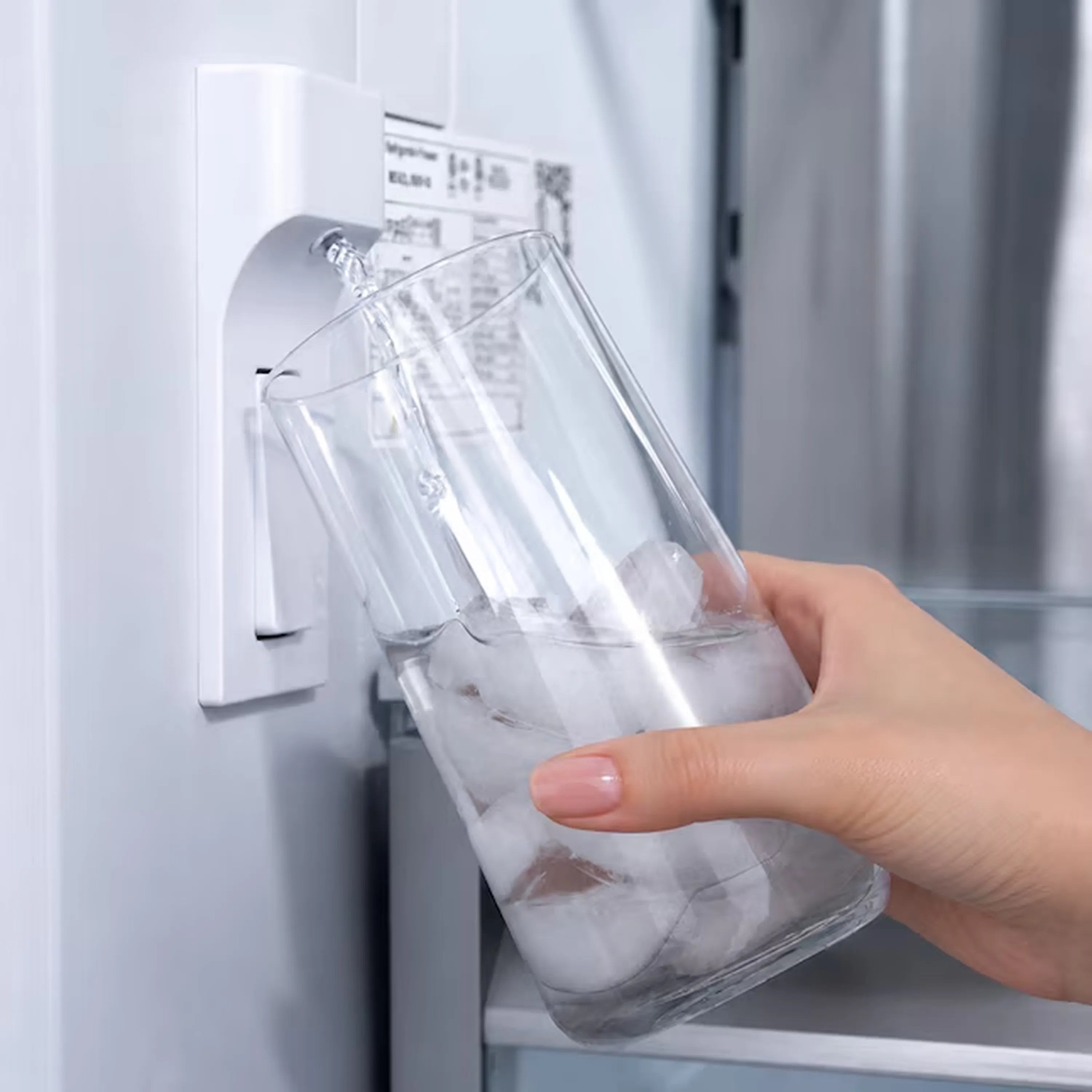 Built-in French door refrigerator ice bucket and dispenser chute, stainless with gold accents