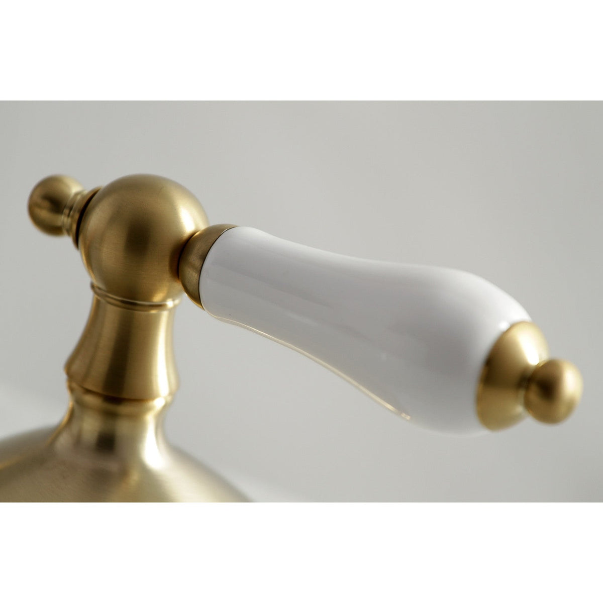 Heritage Widespread Bathroom Faucet with Brass Pop-Up in Brushed Brass