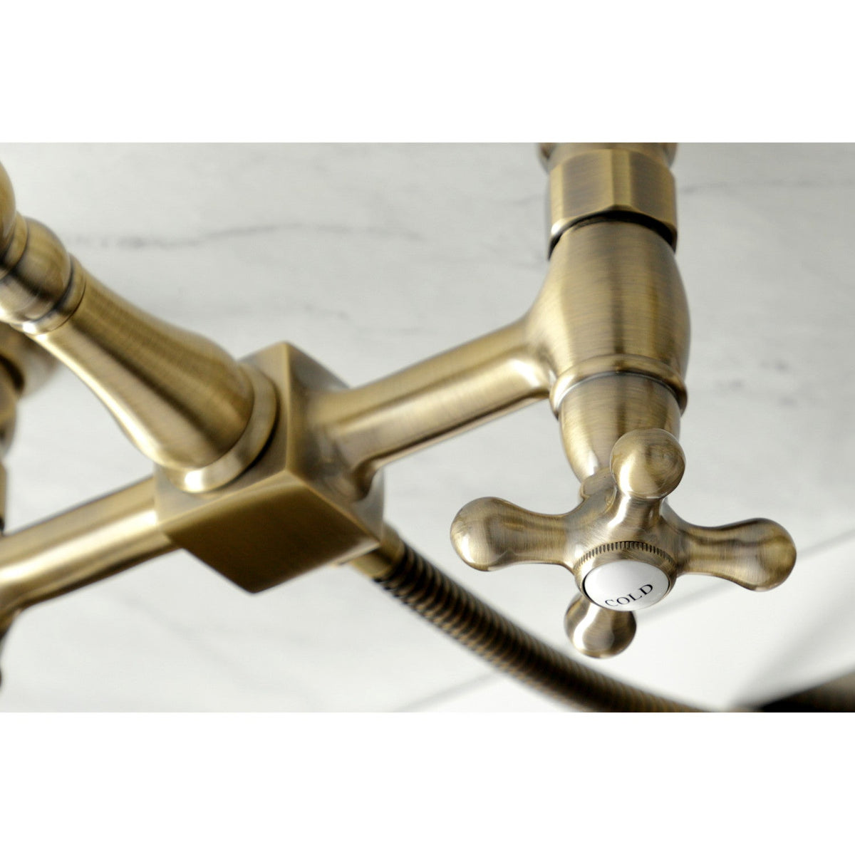 Heritage Double-Handle Wall-Mount Bridge Kitchen Faucet with Brass Sprayer in Antique Brass