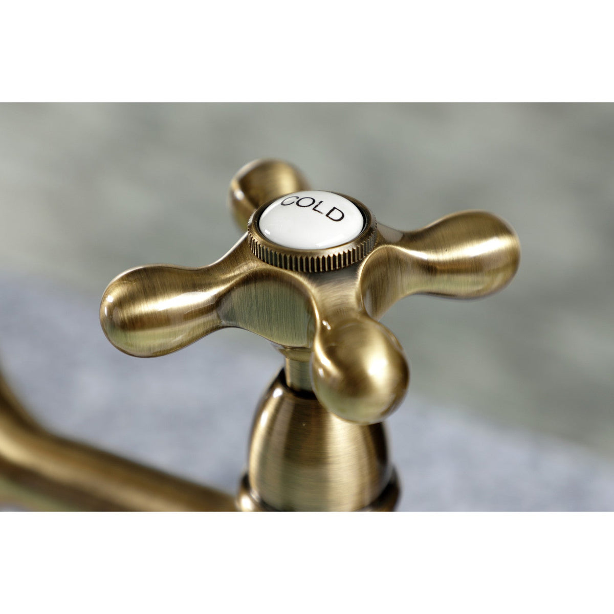 Heritage Bridge Kitchen Faucet with Brass Side Sprayer in Antique Brass