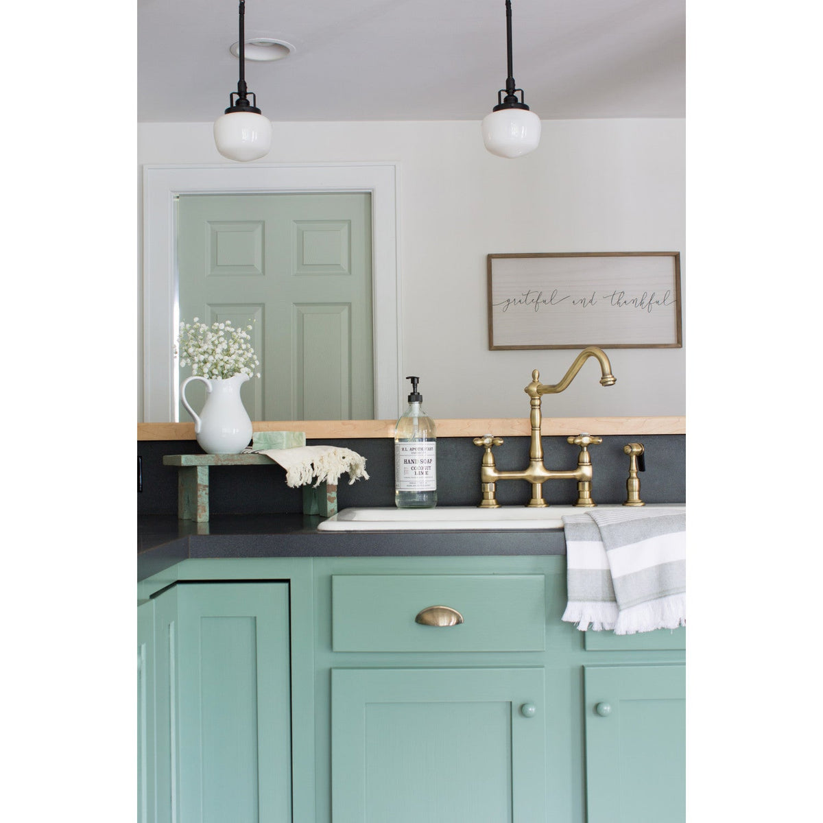 Heritage Bridge Kitchen Faucet with Brass Side Sprayer in Antique Brass