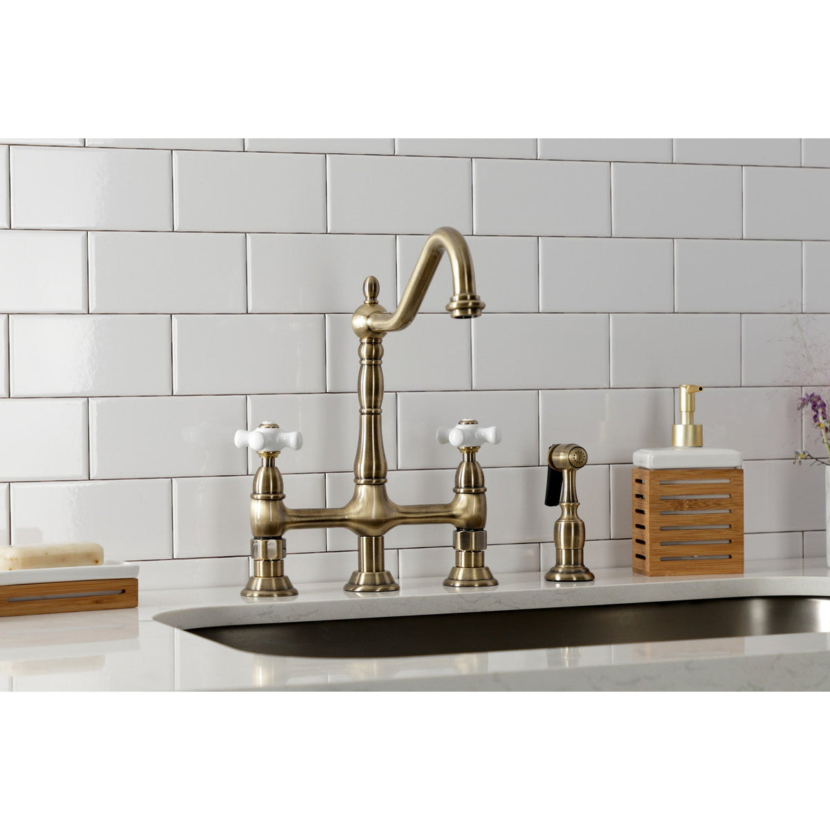 Heritage Bridge Kitchen Faucet with Brass Side Sprayer in Antique Brass