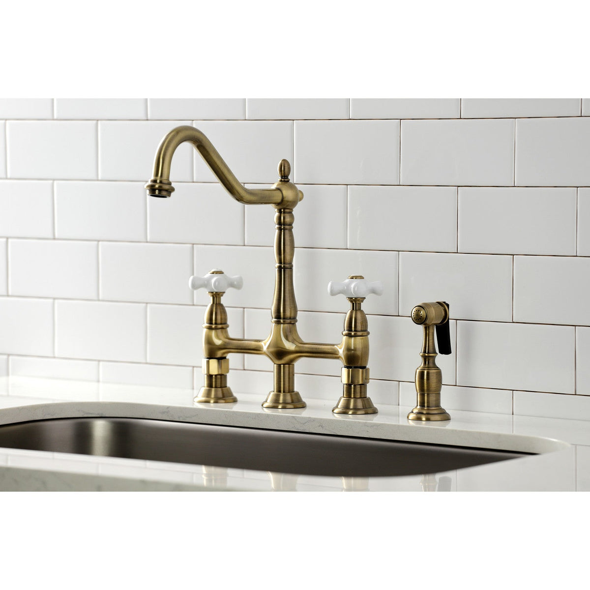 Heritage Bridge Kitchen Faucet with Brass Side Sprayer in Antique Brass