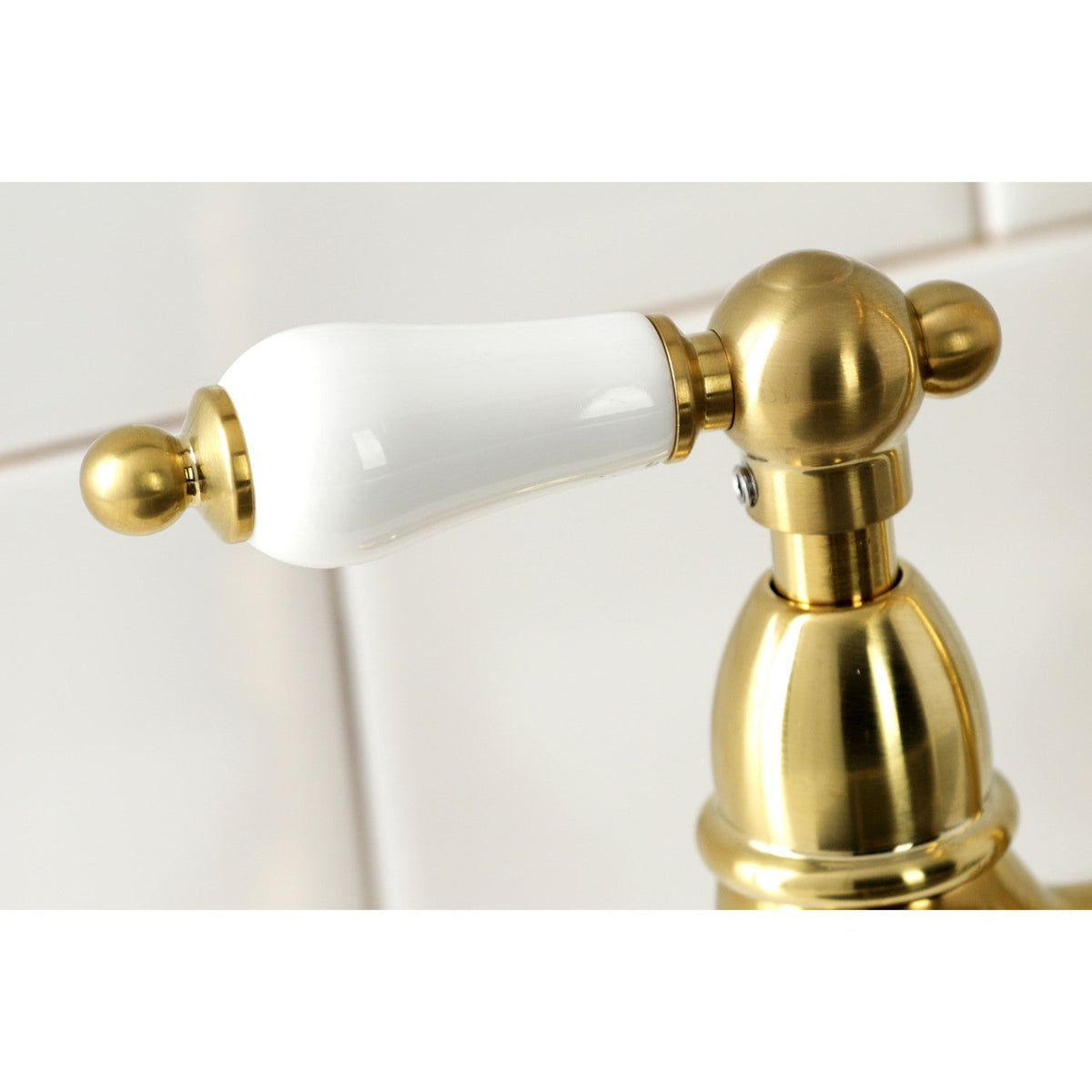 Heritage Bridge Kitchen Faucet with Brass Side Sprayer in Brushed Brass