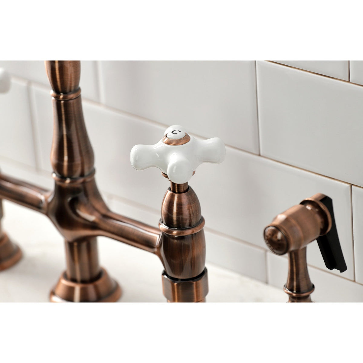 Heritage Bridge Kitchen Faucet with Brass Side Sprayer in Antique Copper