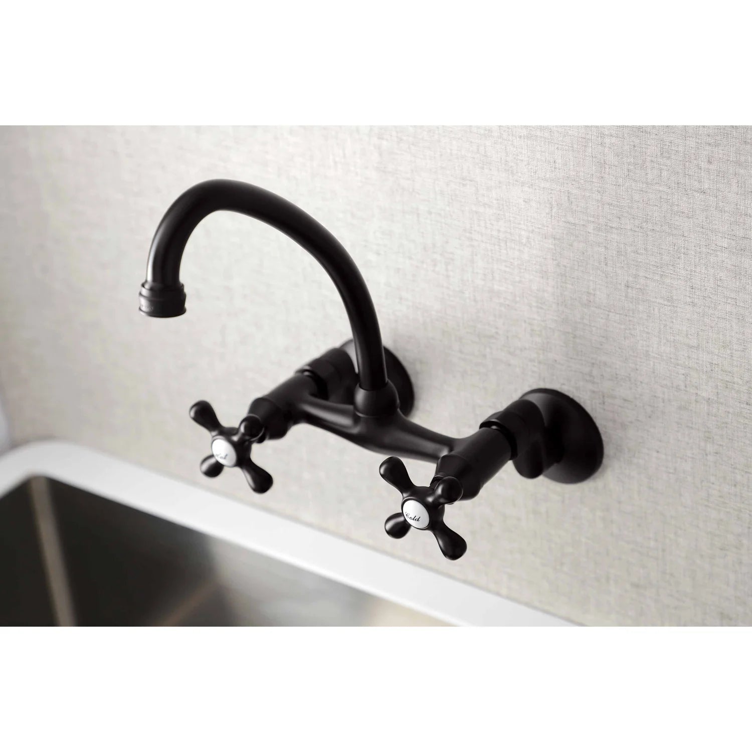Wall-mount bridge kitchen faucet in oil-rubbed bronze with dual handles and curved spout
