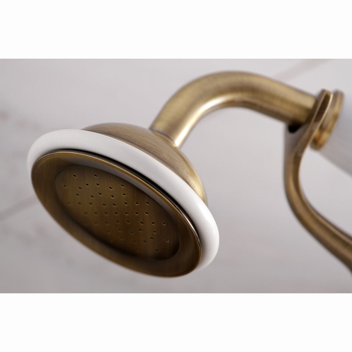 Kingston Wall Mount Clawfoot Tub Faucet with Hand Shower in Antique Brass