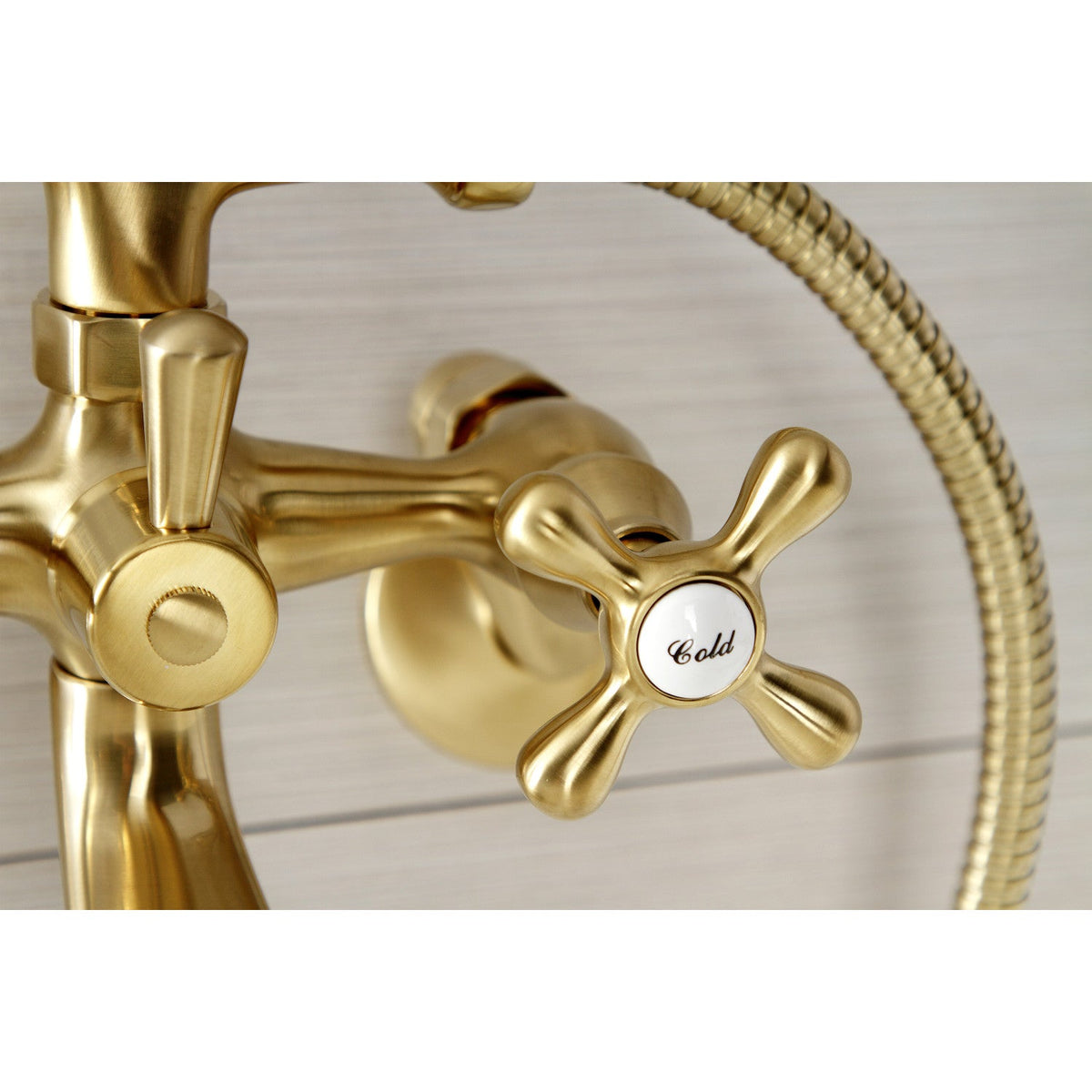 Kingston Wall Mount Clawfoot Tub Faucet with Hand Shower in Brushed Brass