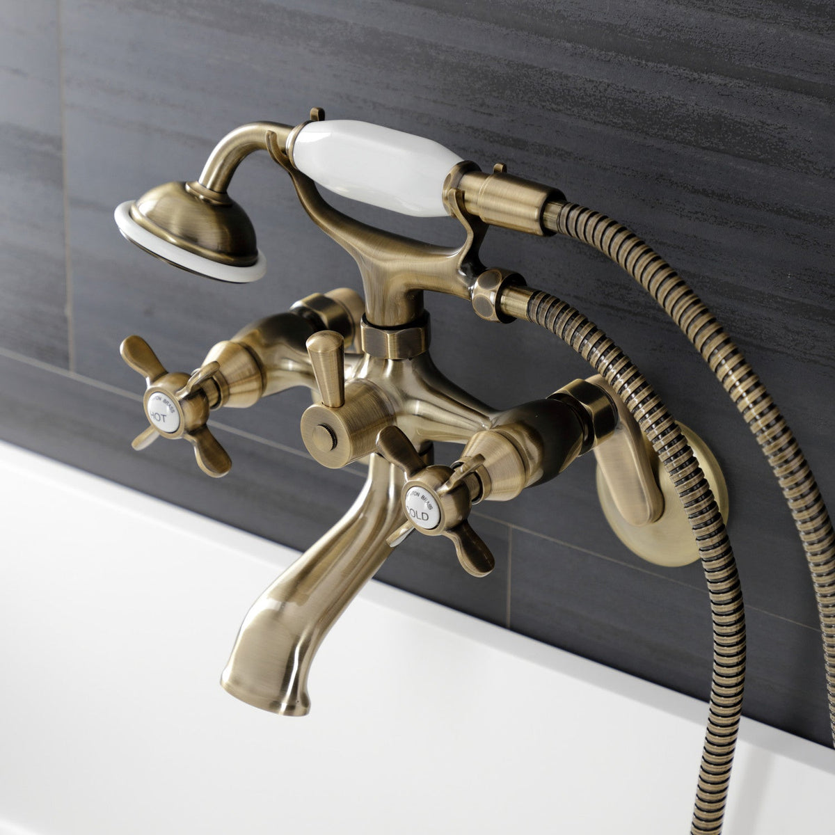 Essex Wall Mount Clawfoot Tub Faucet with Hand Shower in Antique Brass