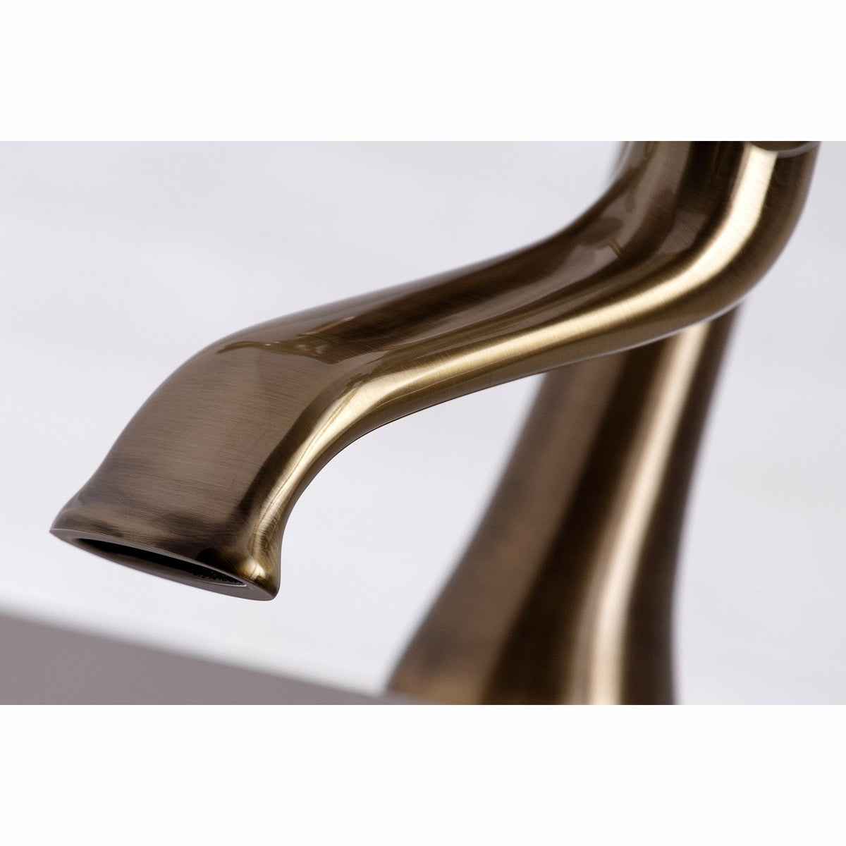 Essex 7" Center Deck-Mount Clawfoot Tub Faucet with Hand Shower in Antique Brass