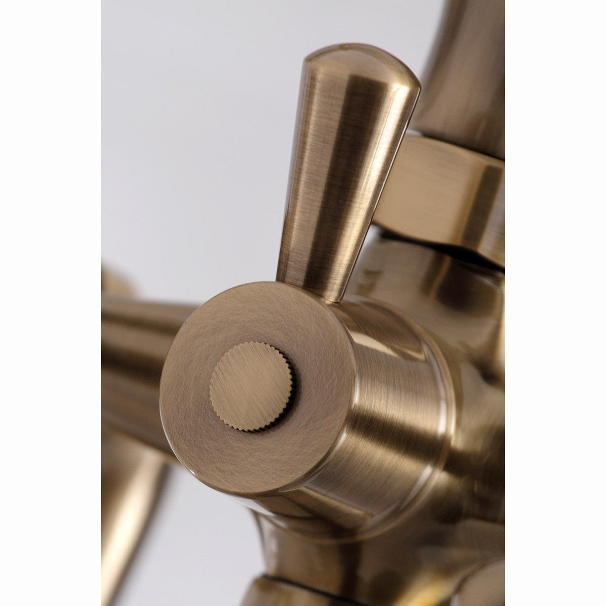 Essex 7" Center Deck-Mount Clawfoot Tub Faucet with Hand Shower in Antique Brass