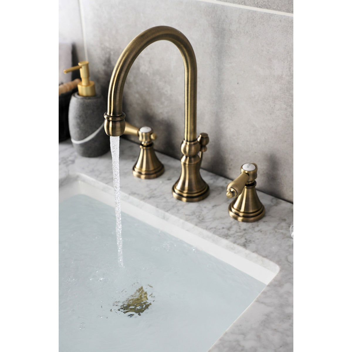 Heirloom Widespread Bathroom Faucet with Brass Pop-Up in Antique Brass
