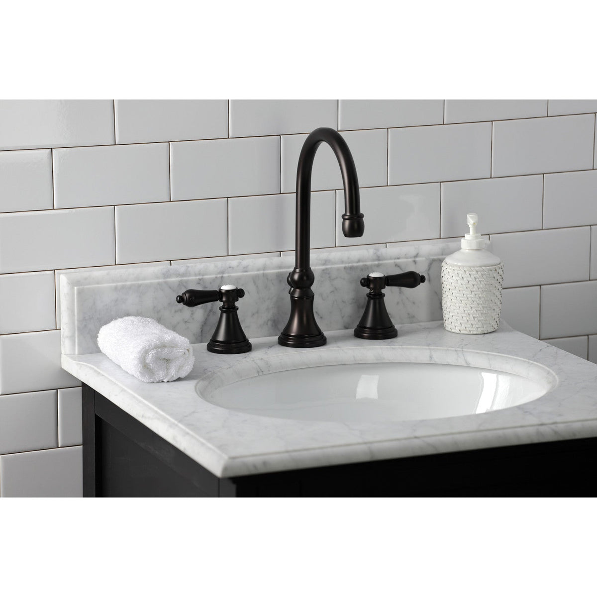 Heirloom Widespread Bathroom Faucet with Brass Pop-Up in Oil Rubbed Bronze