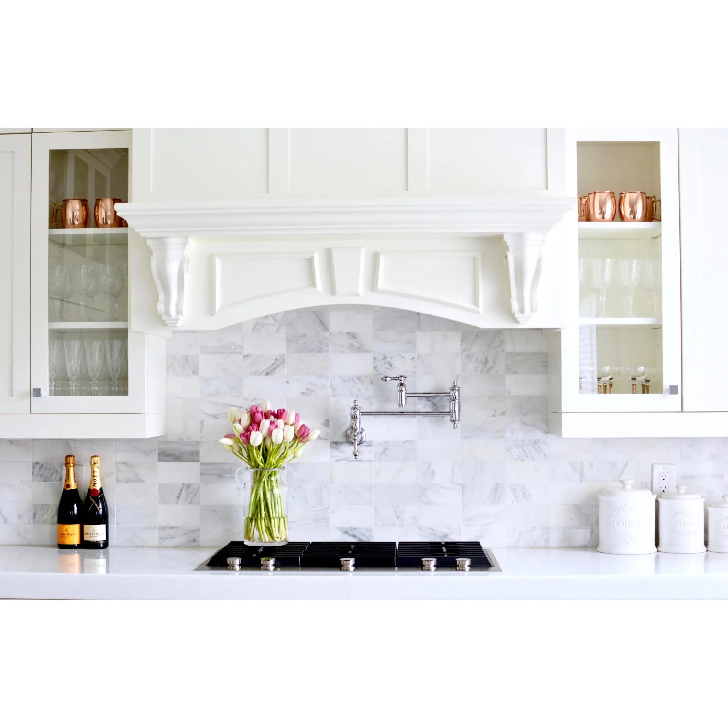 Polished chrome wall-mount pot filler faucet with two arms and cross handles