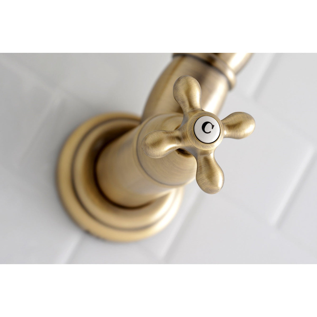 Restoration Wall Mount Pot Filler Faucet in Antique Brass