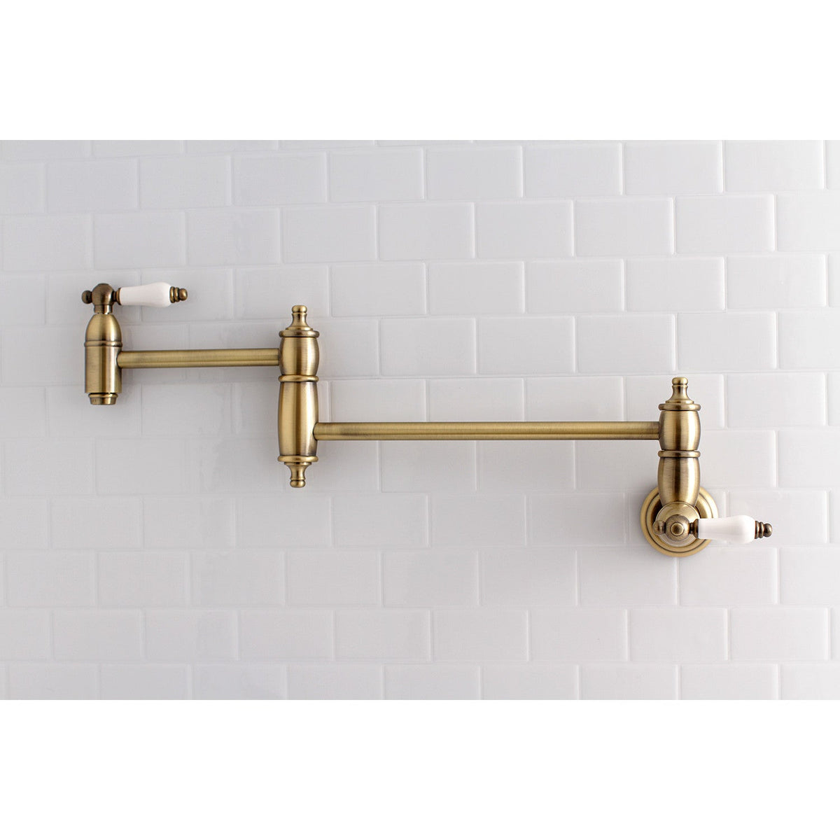 Restoration Wall Mount Pot Filler Faucet in Antique Brass