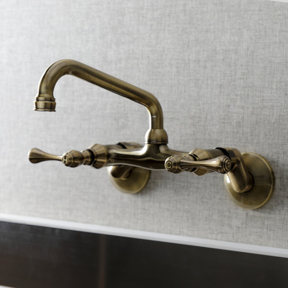 Kingston Double-Handle Wall-Mount Bridge Kitchen Faucet in Antique Brass