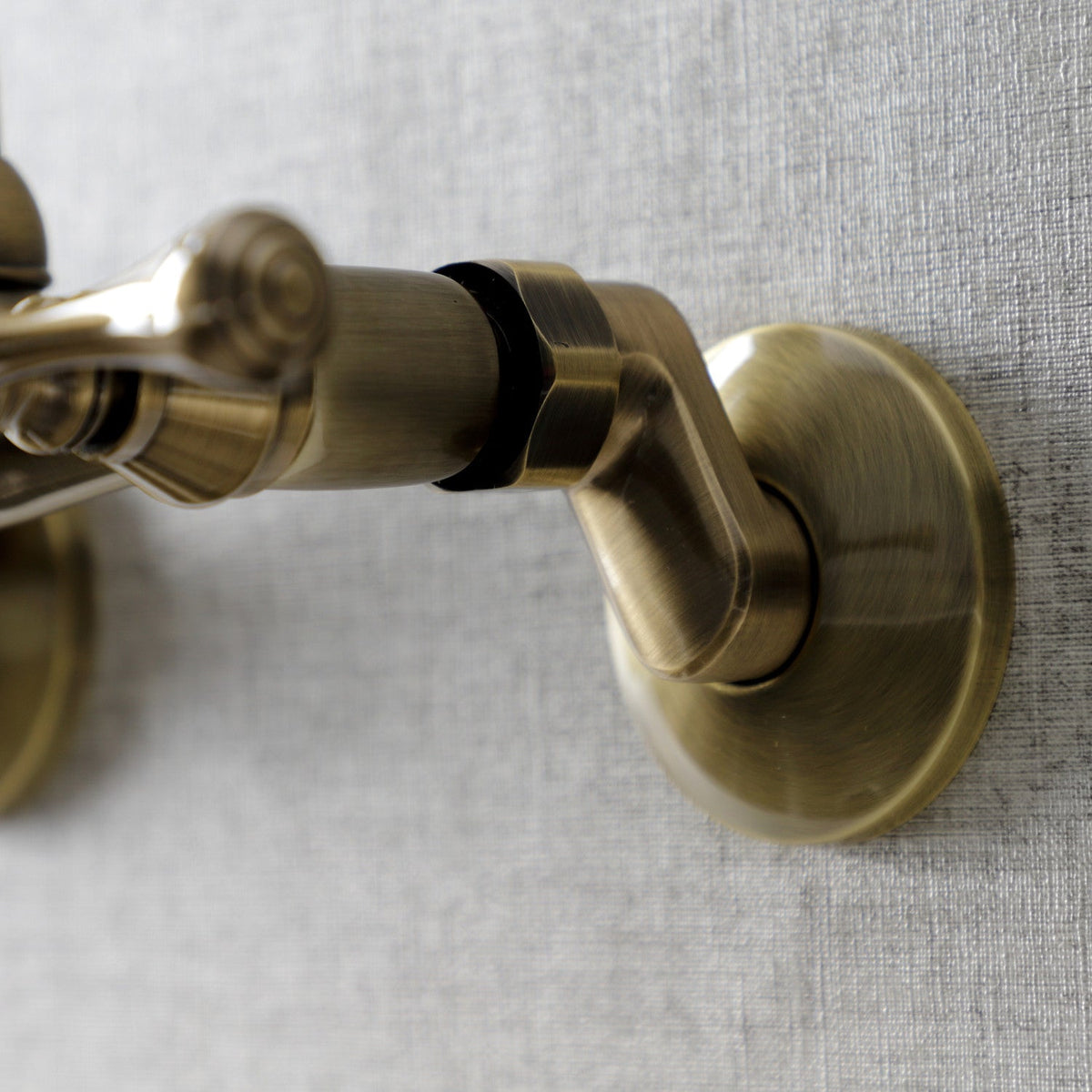 Kingston Double-Handle Wall-Mount Bridge Kitchen Faucet in Antique Brass