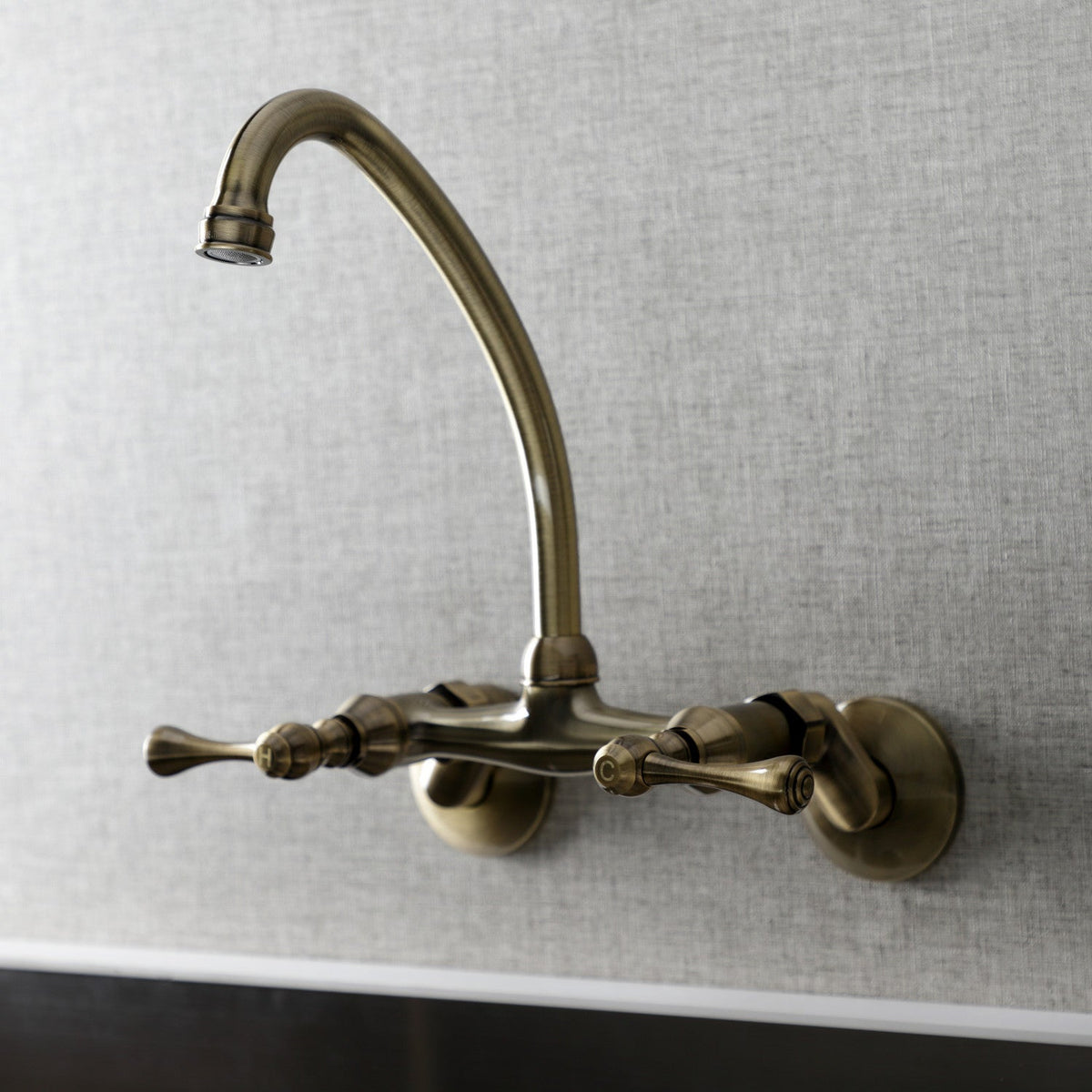 Kingston Double-Handle Wall-Mount Bridge Kitchen Faucet in Antique Brass