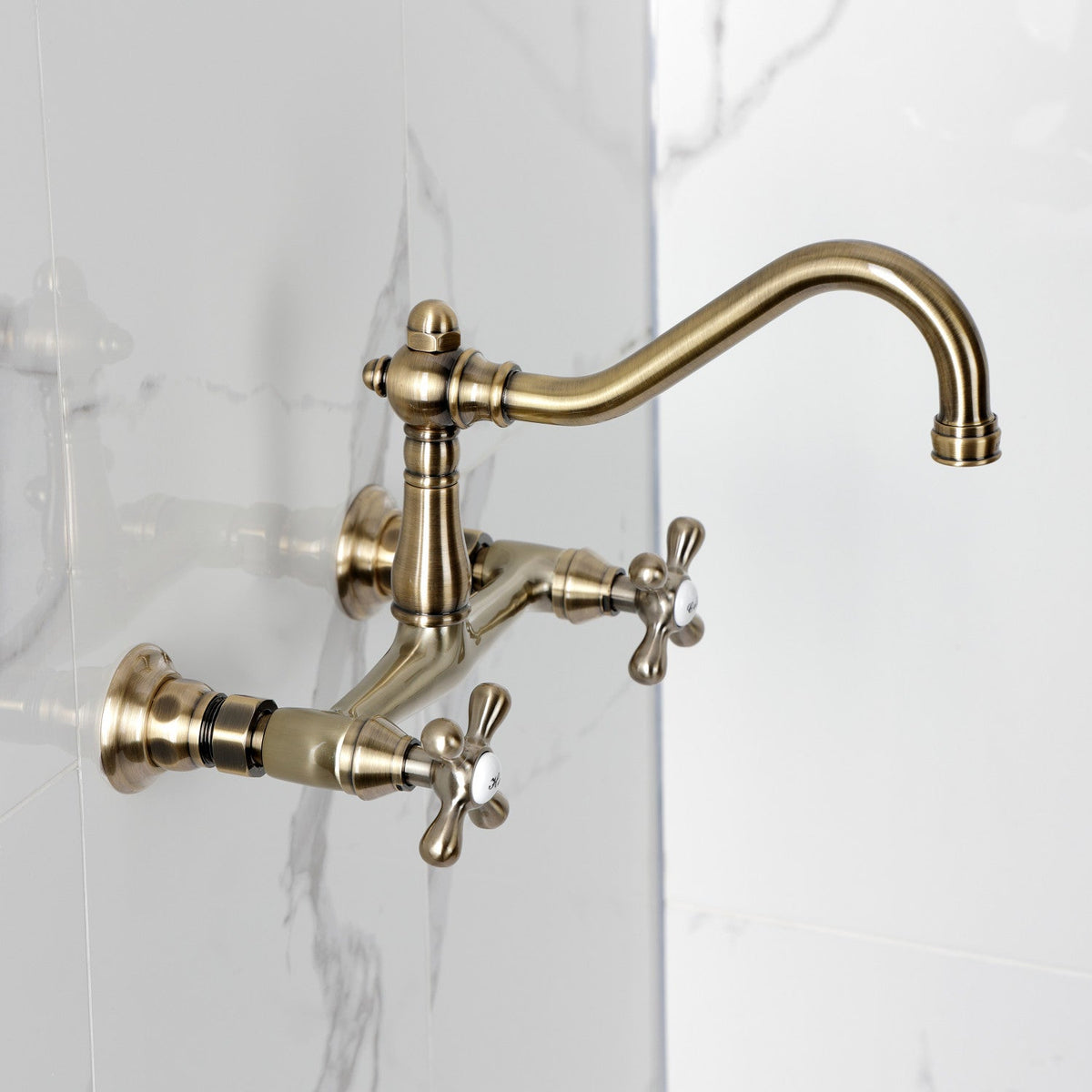 Vintage Double-Handle 2-Hole Wall Mount Bathroom Faucet in Antique Brass