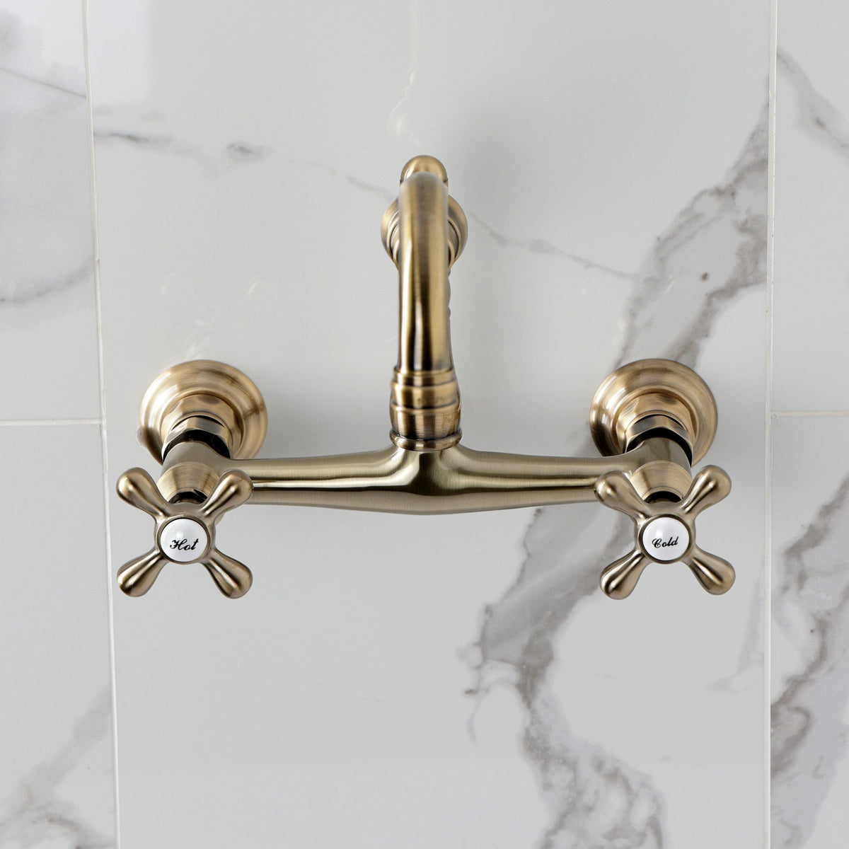 Vintage Double-Handle 2-Hole Wall Mount Bathroom Faucet in Antique Brass