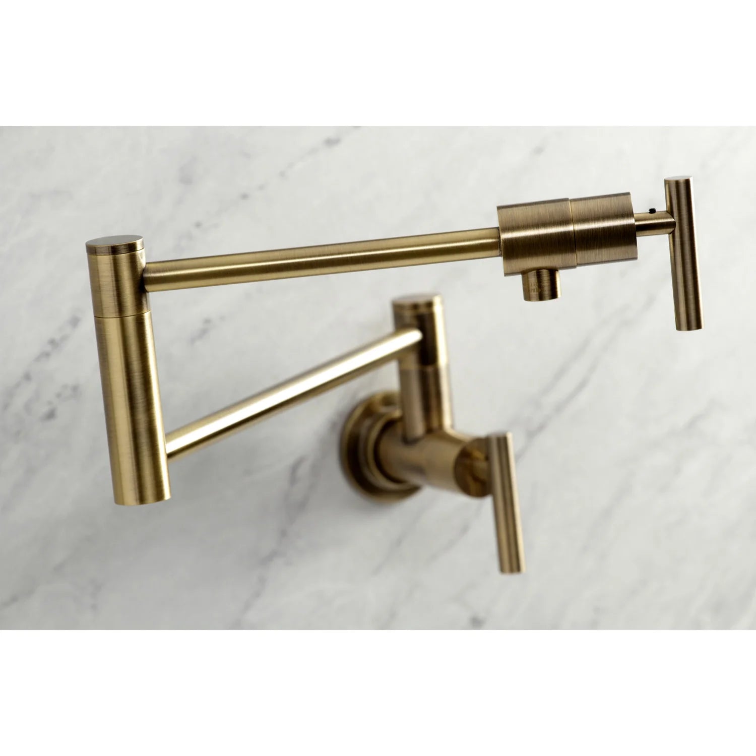 Wall mount pot filler faucet with antique brass spout and side handles