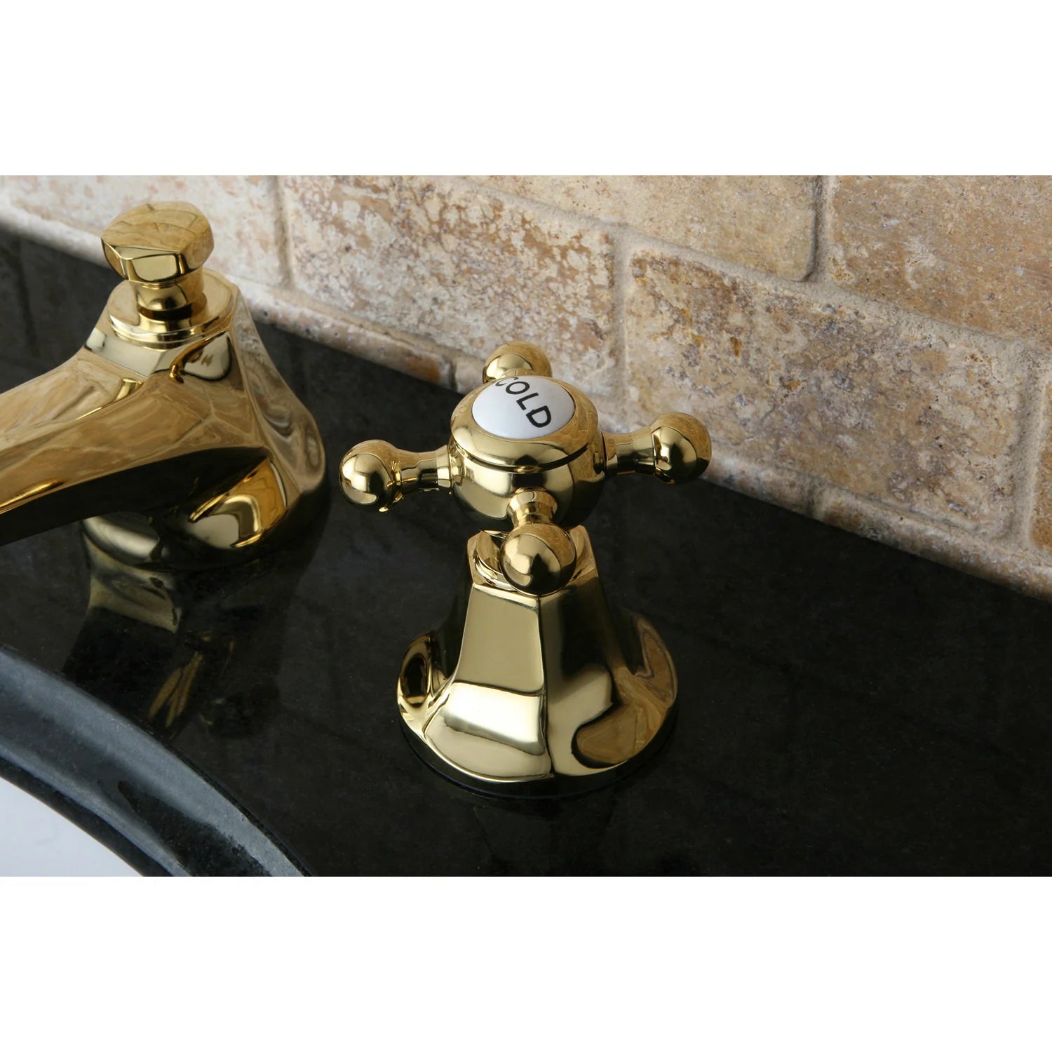 Polished brass faucet handle with cold marking and arched spout