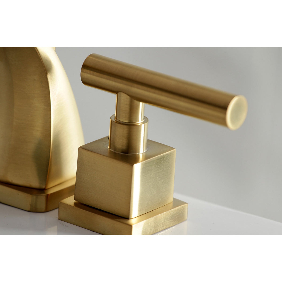Claremont Widespread Bathroom Faucet with Brass Pop-Up in Brushed Brass