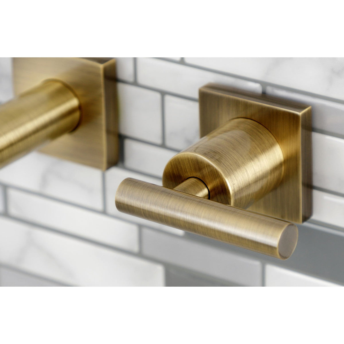 Manhattan Two-Handle Wall Mount Roman Tub Faucet in Antique Brass