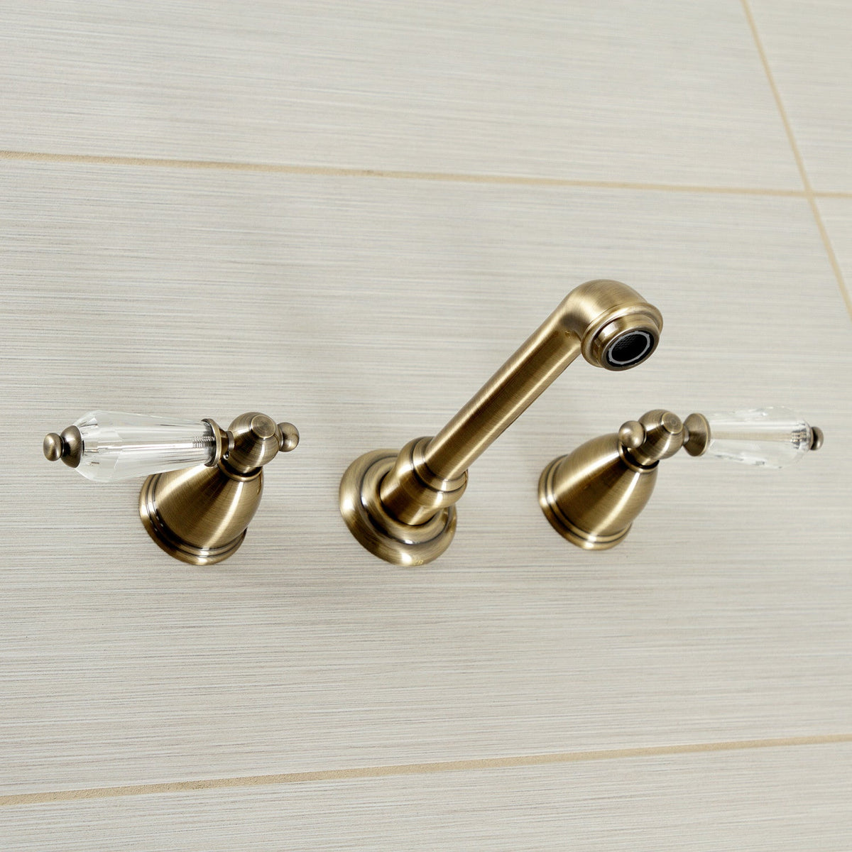 Wilshire Two-Handle Wall Mount Roman Tub Faucet in Antique Brass